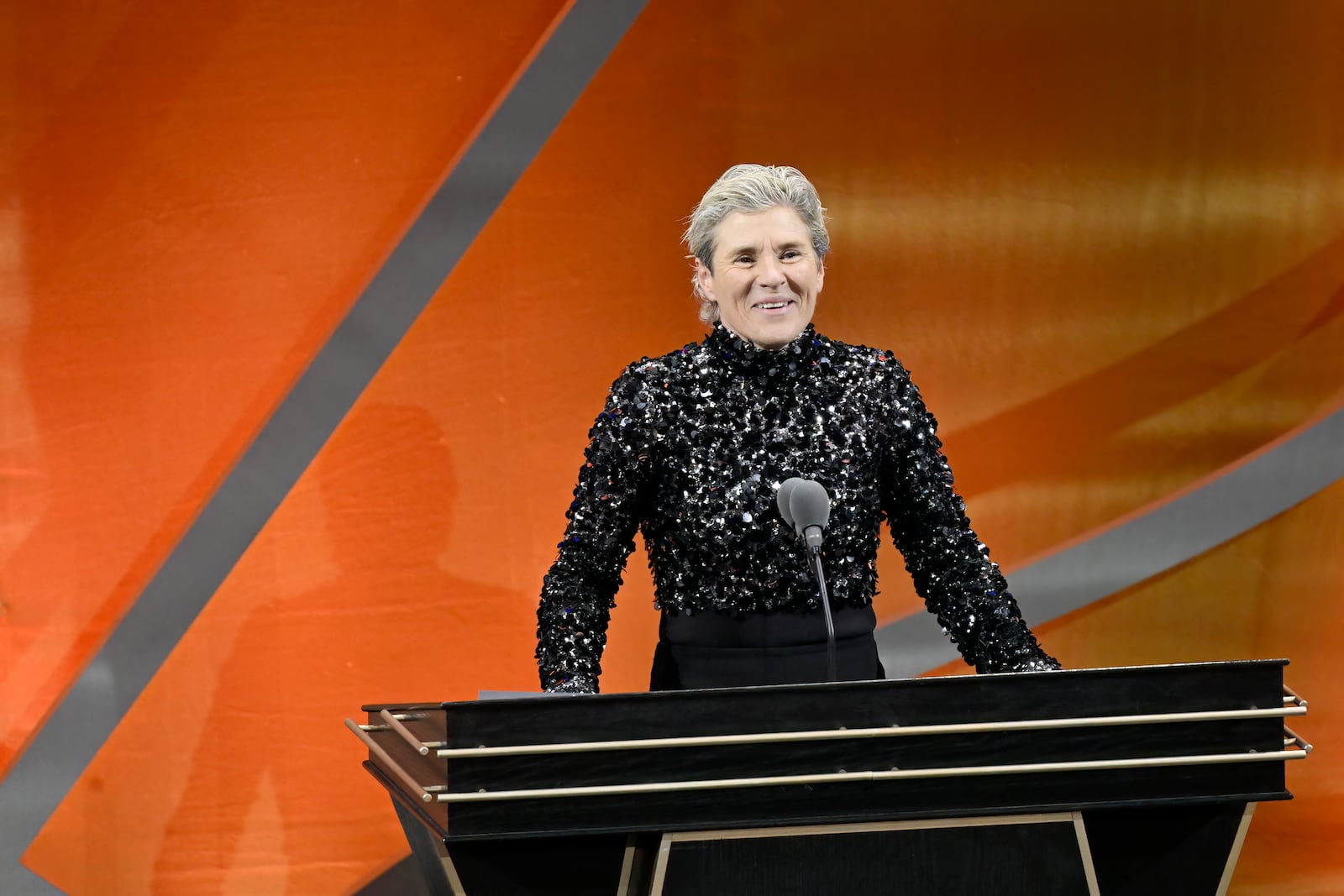 Michele Timms speaks during her enshrinement at the Basketball Hall of Fame, Sunday Oct. 13, 2024, in Springfield, Mass. (AP Photo/Jessica Hill)