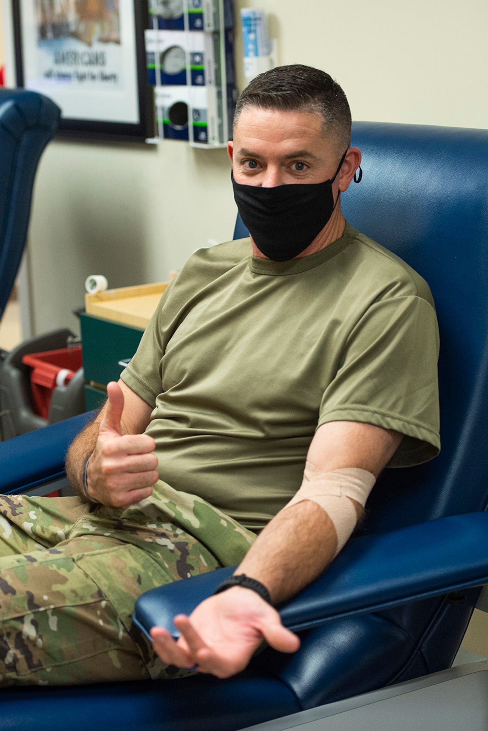 Chief Master Sgt. Jason Shaffer, 88th Air Base Wing command chief, gives a thumbs-up after donating Oct. 19 during the Senior NCO Blood Drive at Wright-Patterson Air Force Base’s Blood Donor Center. U.S. AIR FORCE PHOTO/WESLEY FARNSWORTH