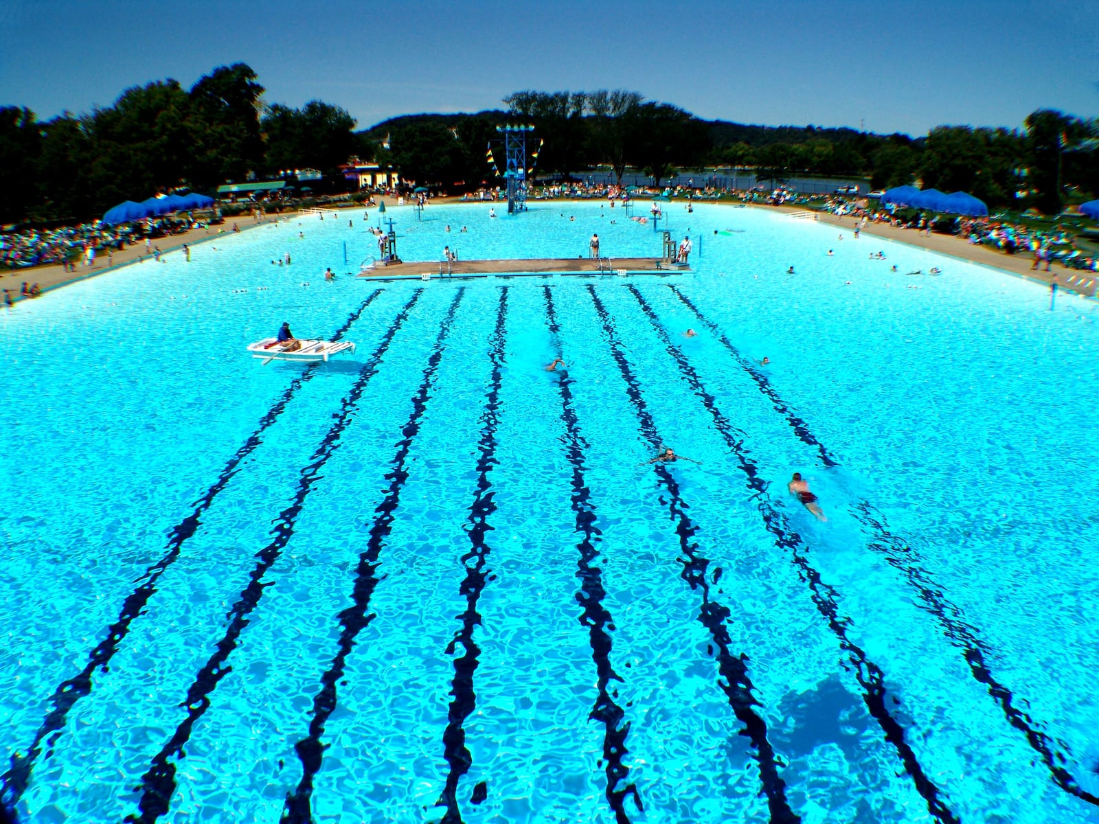 Coney Island officials say that the park's Sunlite Pool, with more than three million gallons of water, is the world's largest flat surfaced recirculating pool. The park is east of Cincinnati.