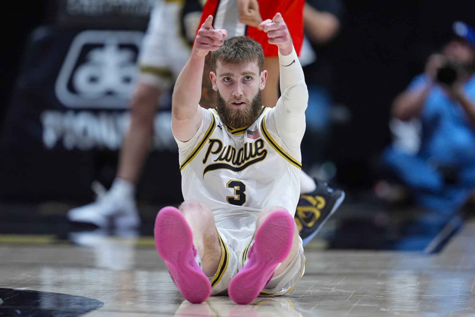 Purdue guard Braden Smith (3) celebrates after a defensive stop against Ohio State during the second half of an NCAA college basketball game in West Lafayette, Ind., Tuesday, Jan. 21, 2025. (AP Photo/Michael Conroy)