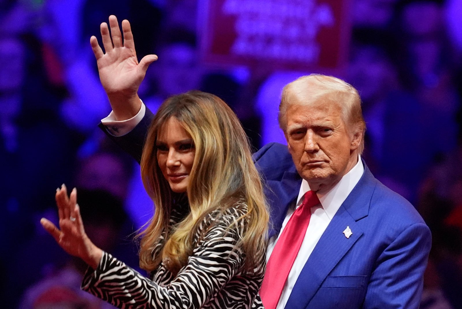 Republican presidential nominee former President Donald Trump and former first lady Melania Trump wave at a campaign rally at Madison Square Garden, Sunday, Oct. 27, 2024, in New York. (AP Photo/Evan Vucci)