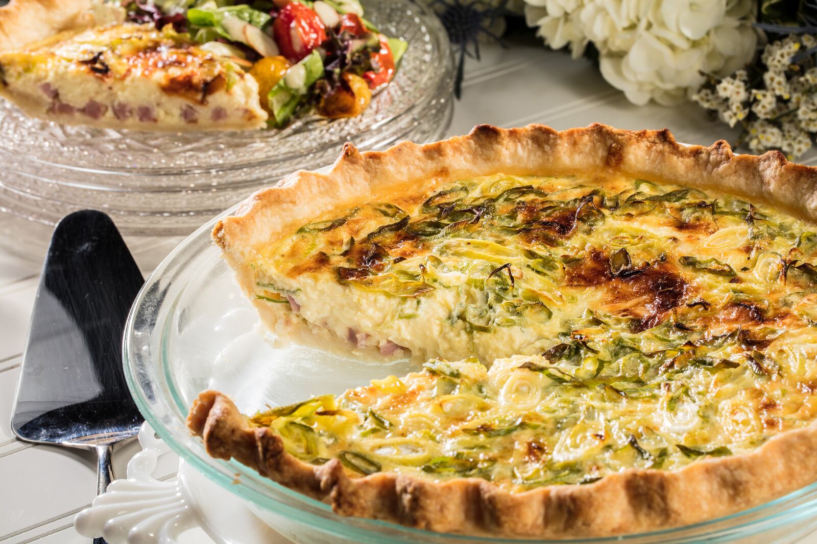 In a variation on quiche Lorraine, ham and cheese flavor a simple custard of egg yolks and milk. (Zbigniew Bzdak/Chicago Tribune/TNS)