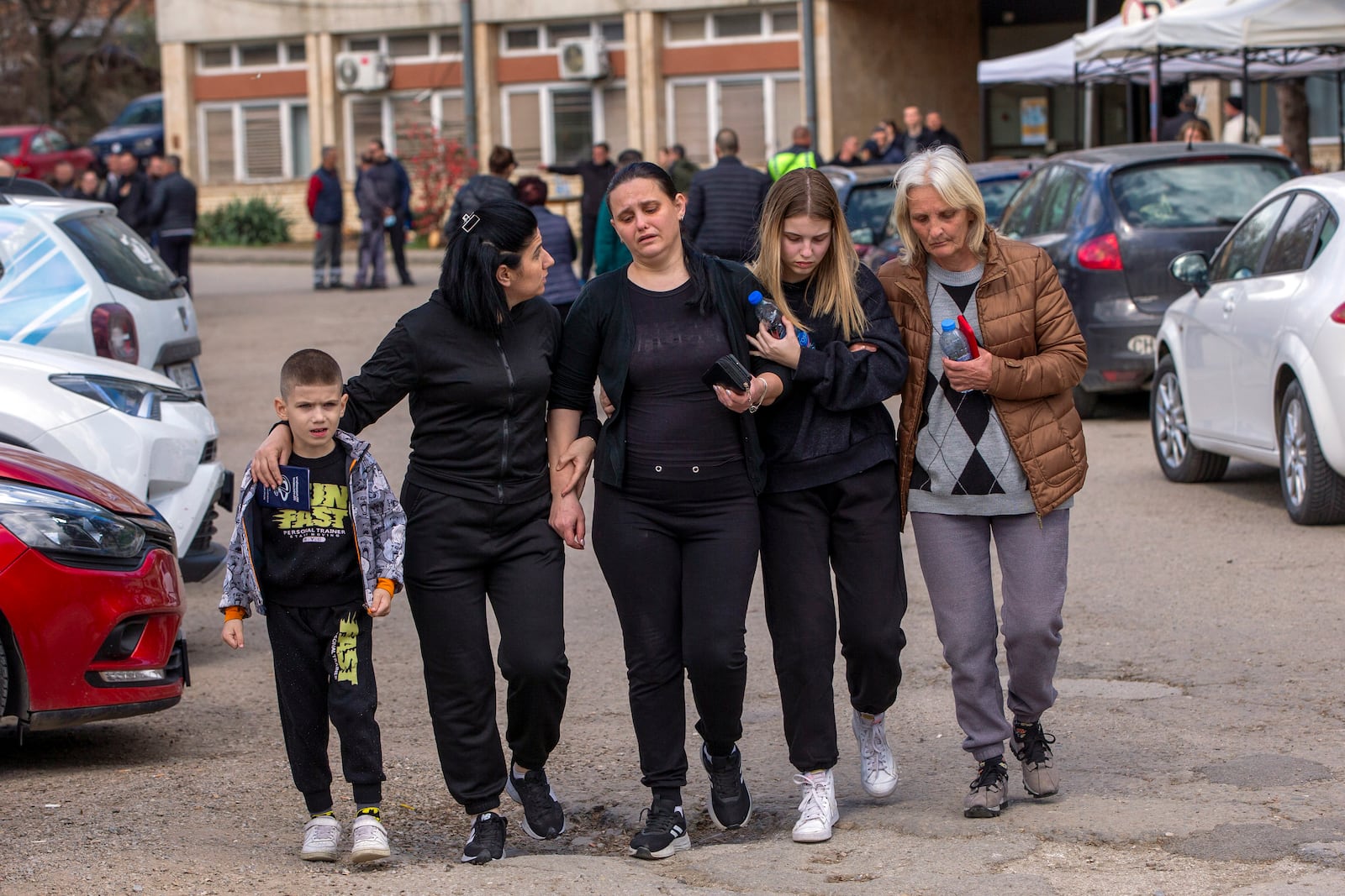 Relatives of victims leave a hospital in the town of Kocani, North Macedonia, Monday, March 17, 2025, following a massive fire in the nightclub early Sunday. (AP Photo/Visar Kryeziu)