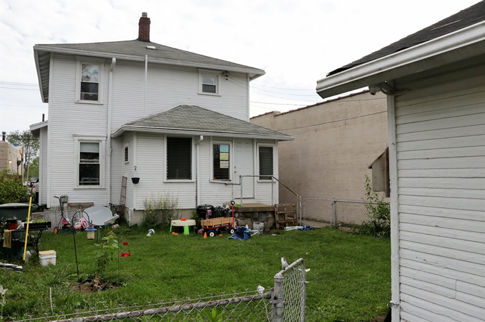 The fenced back yard is tucked between the house and the 2-car, detached garage with alley access. CONTRIBUTED PHOTO BY KATHY TYLER