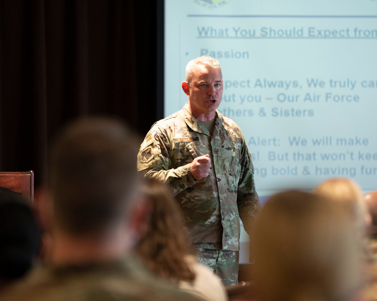 Col. Christopher Meeker, 88 ABW and installation commander, along with Chief Master Sgt. Lloyd Morales, the wing’s command chief, briefly met with Airmen and civilian personnel at the Wright-Patt Club in their first official address since assuming command in early July.