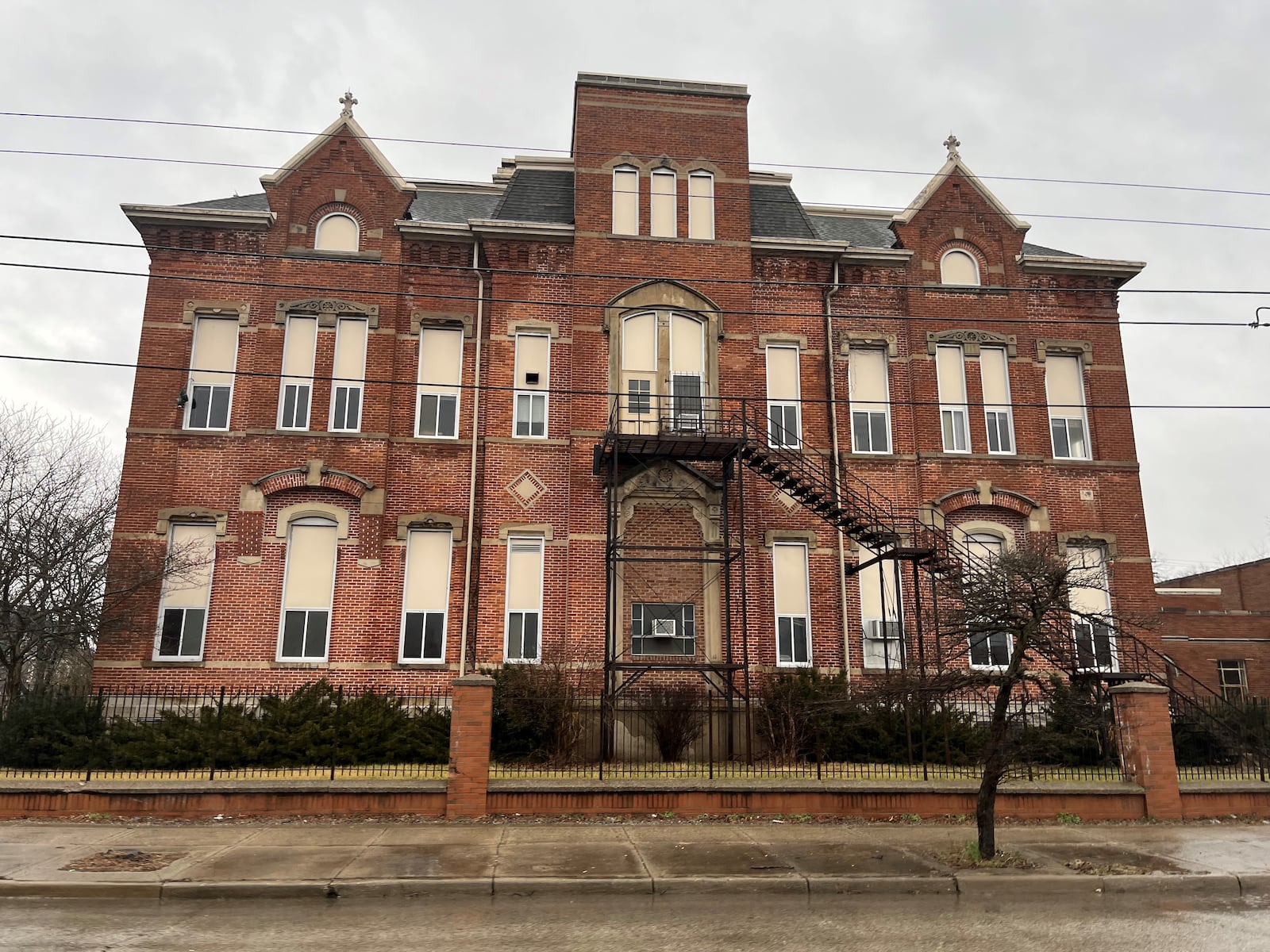 The Longfellow school campus could be converted into 125 to 130 new housing units and amenities like a theater and aqua farm. CORNELIUS FROLIK / STAFF