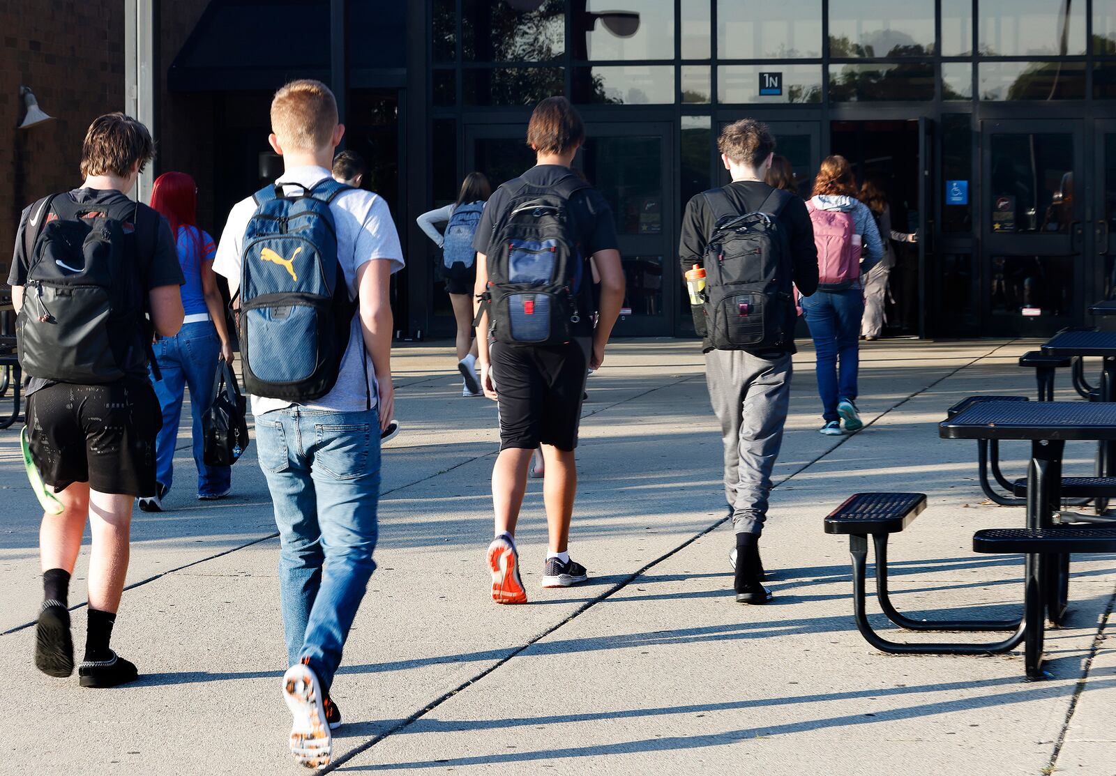 Students arrive Wednesday, Aug. 14, 2024 for the first day of school at Beavercreek High School. MARSHALL GORBY\STAFF