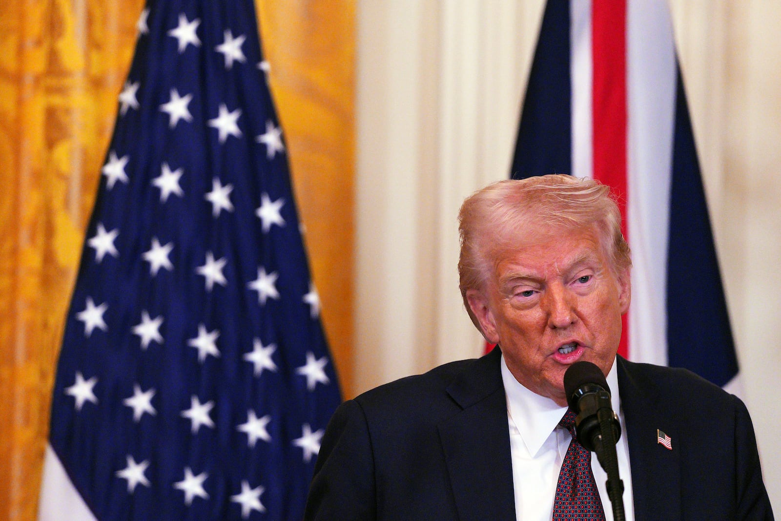 U.S. President Donald Trump speaks during a joint press conference with Britain's Prime Minister Keir Starmer in the East Room at the White House Thursday, Feb. 27, 2025, in Washington. (Carl Court/Pool Photo via AP)