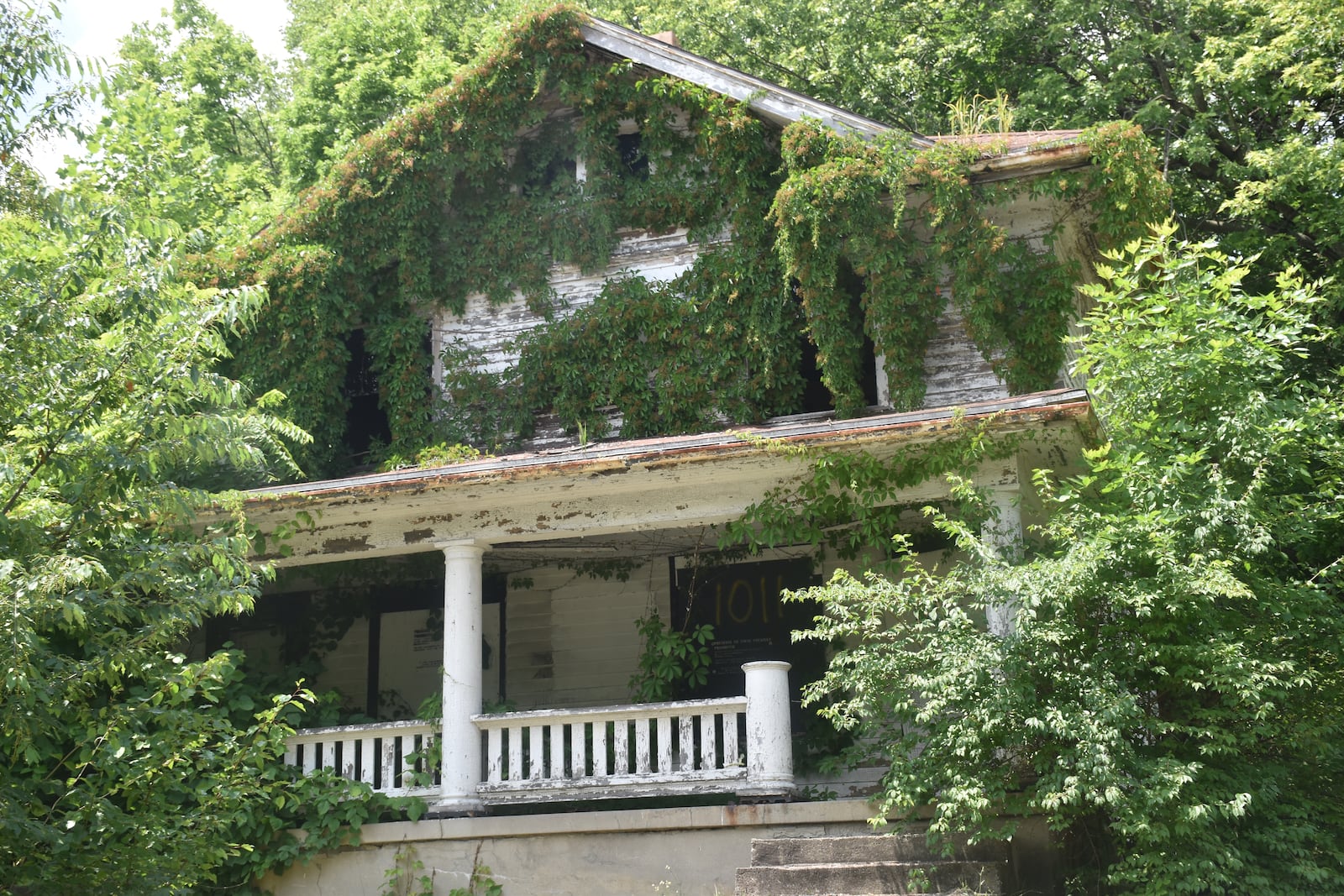 A blighted, vacant home in the Southern Dayton View neighborhood. CORNELIUS FROLIK / STAFF