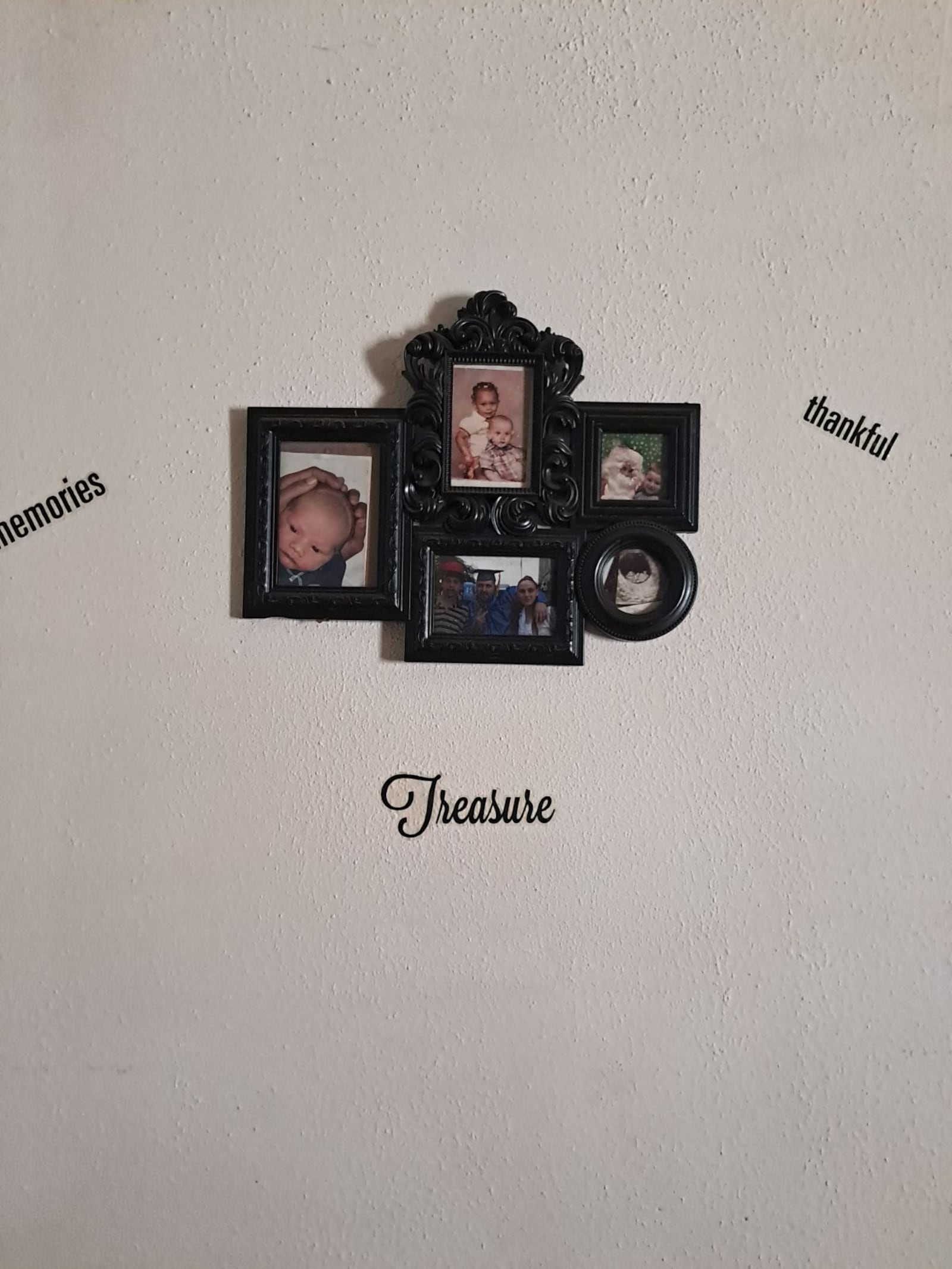 Framed photos and decals hang in the Edie Philbeck and Brandon Wallace’s home in the East End neighborhood in Dayton (photo courtesy of Edie Philbeck)