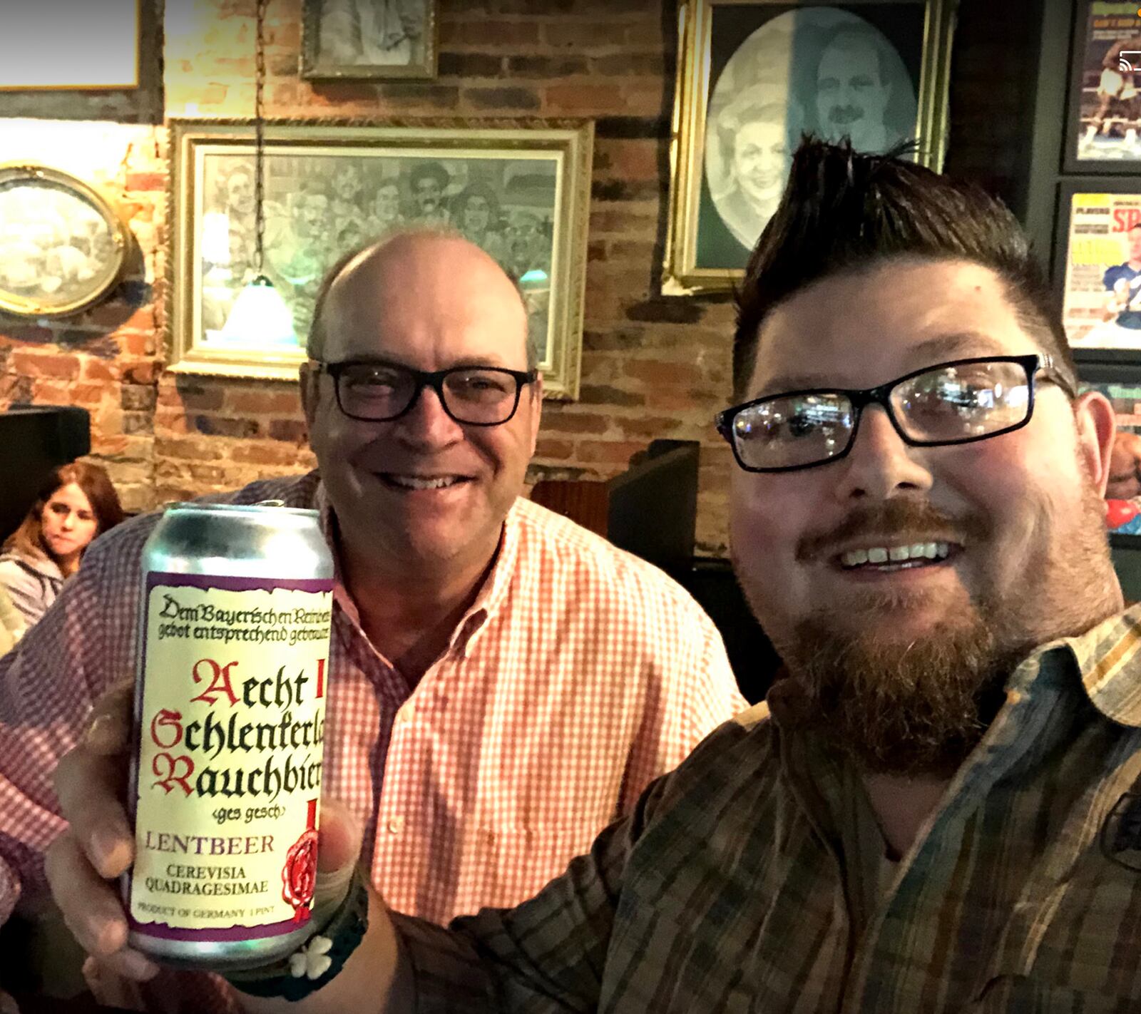 Del Hall (right) enjoys a beer with "Bengal Jim" Foster. CONTRIBUTED