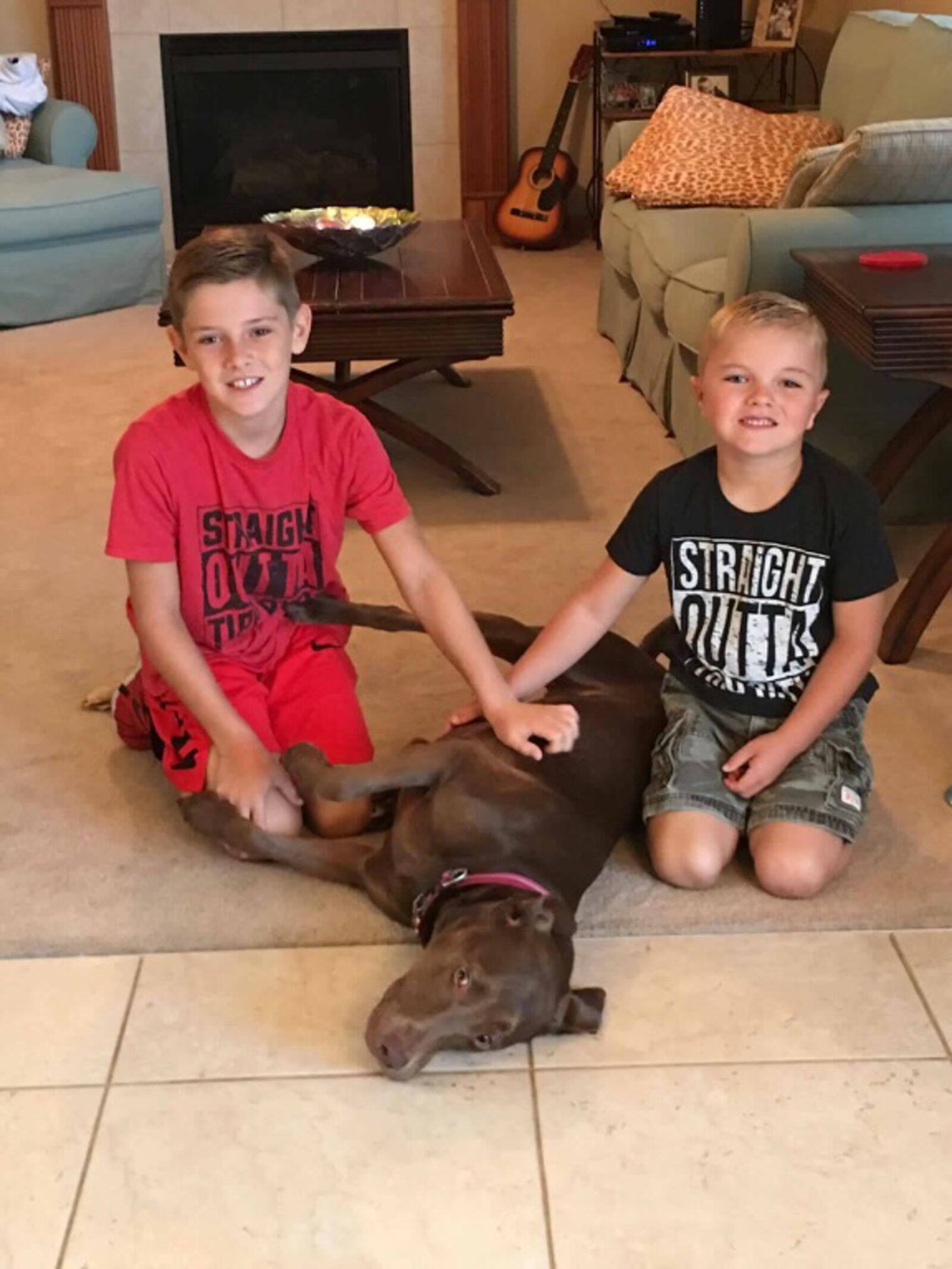 Collin Isaac collected more than 140 pounds of pet food at his birthday party in August. The items will be donated to animals impacted by Hurricane Harvey.  Collin is picture with is dog Maddie and little brother Wyatt.