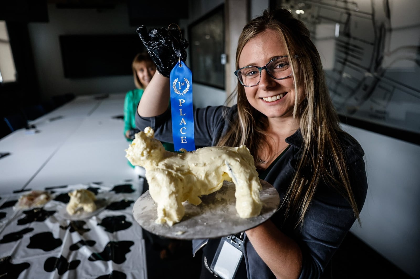 Food & Dining Reporter Natalie Jones and Publisher Suzanne Klopfenstein attempted to make their own butter cow in honor of the display at the Ohio State Fair. Jones ended up taking home first place. JIM NOELKER/STAFF