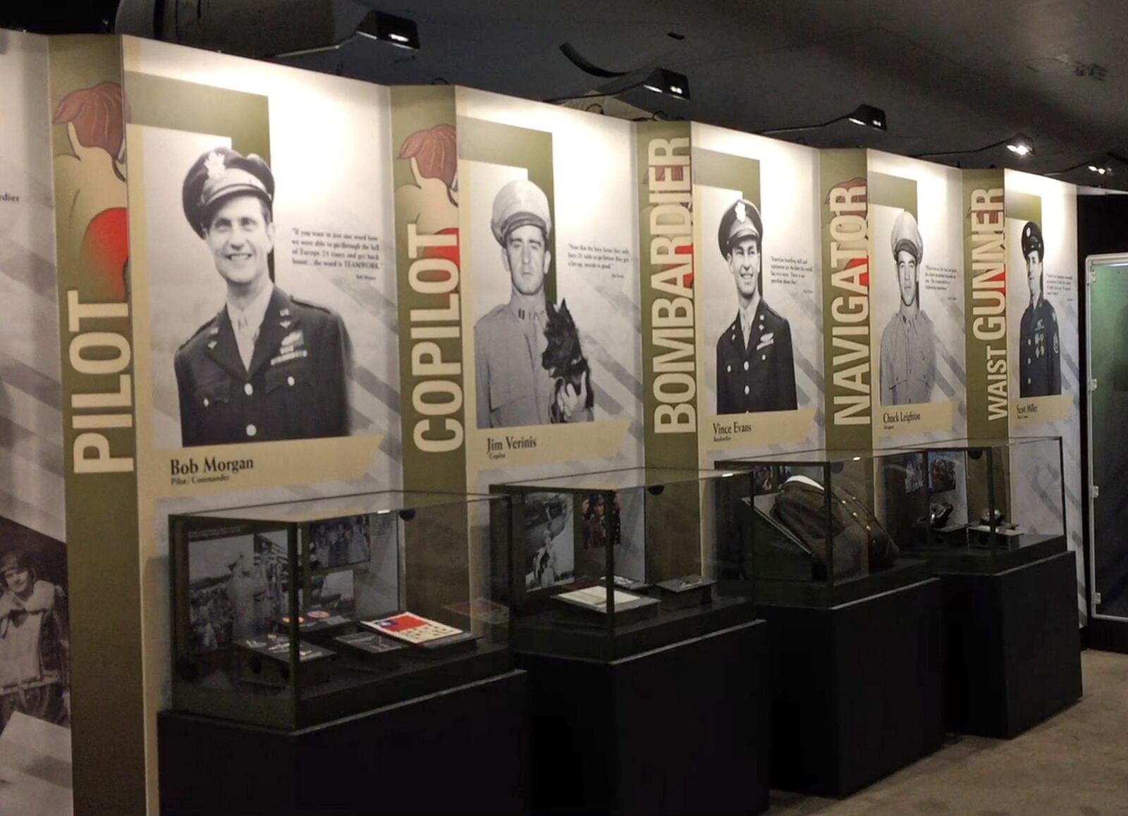 A section of memorabilia, portraits and quotes from Memphis Belle crew members.  The National Museum of the U.S. Air Force opened the Memphis Belle exhibit to the public on Thursday after a 13-year restoration.  Staff and volunteers worked 55,000 hours to restore the iconic World War II bomber.    TY GREENLEES / STAFF