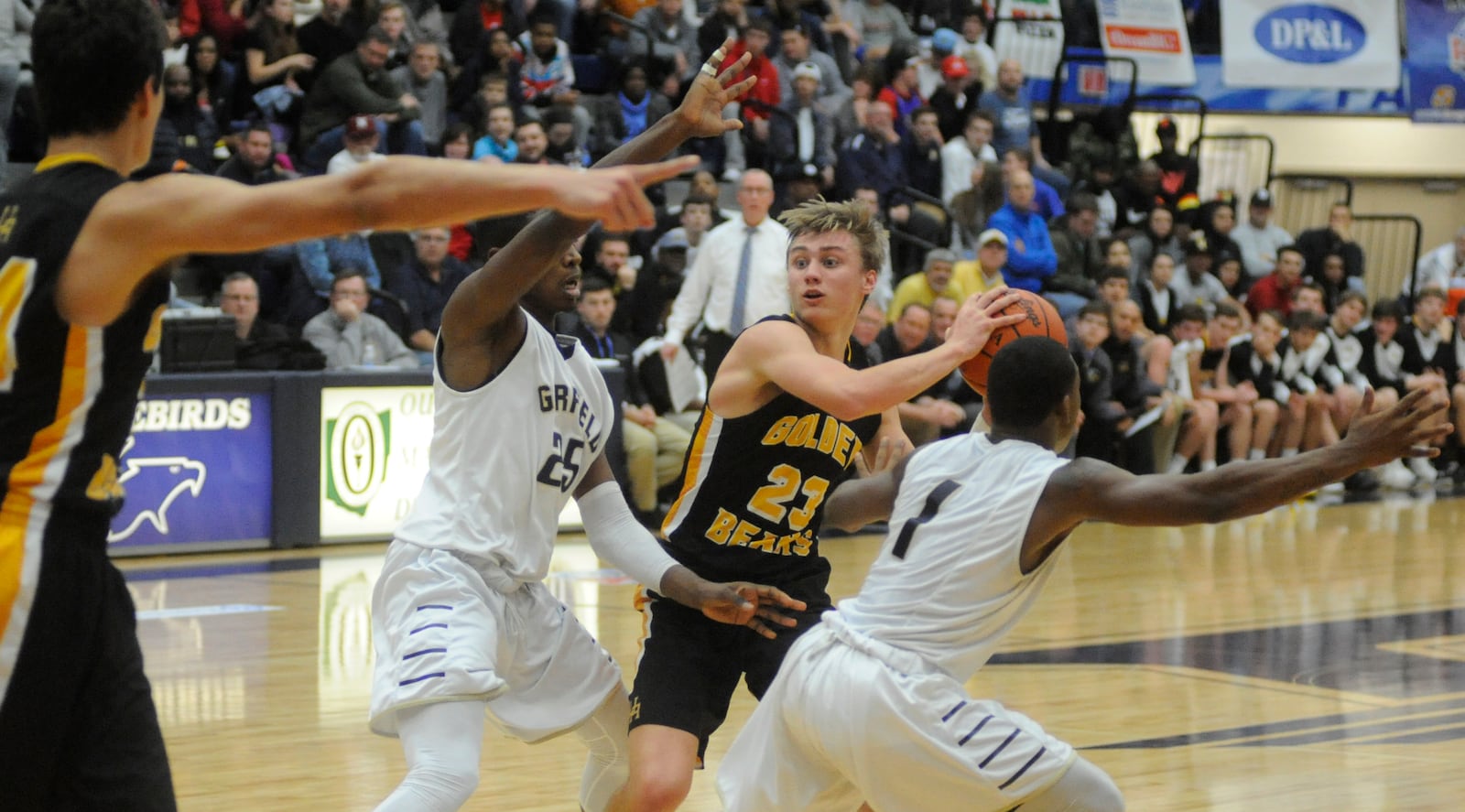 Dane Goodwin of Upper Arlington (with ball) is verbally committed to Ohio State University. He scored 34 points in a 62-34 defeat of Garfield Heights in Day 3 of the Premier Health Flyin’ to the Hoop at Trent Arena in Kettering on Sunday, Jan. 15, 2017. MARC PENDLETON / STAFF