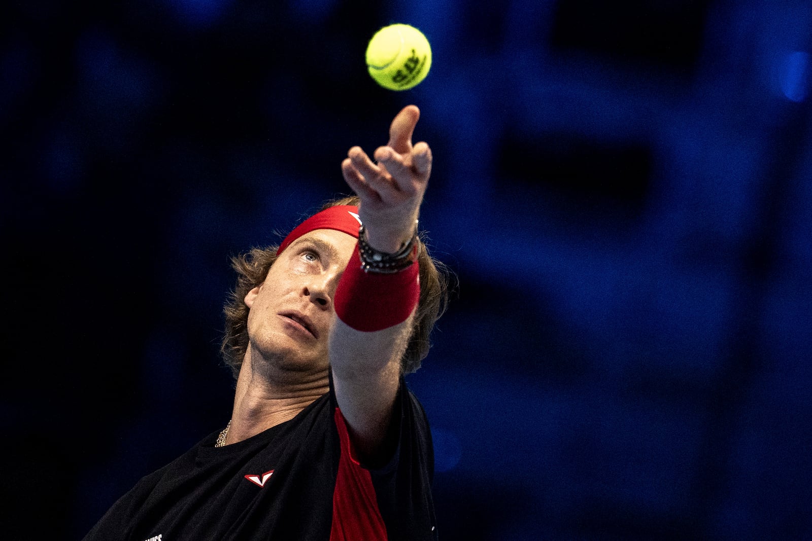 Russia's Andrey Rublev serves to Germany's Alexander Zverev at the ATP Finals tennis tournament in Turin, Italy, Monday, Nov. 11, 2024. (Marco Alpozzi/LaPresse via AP)