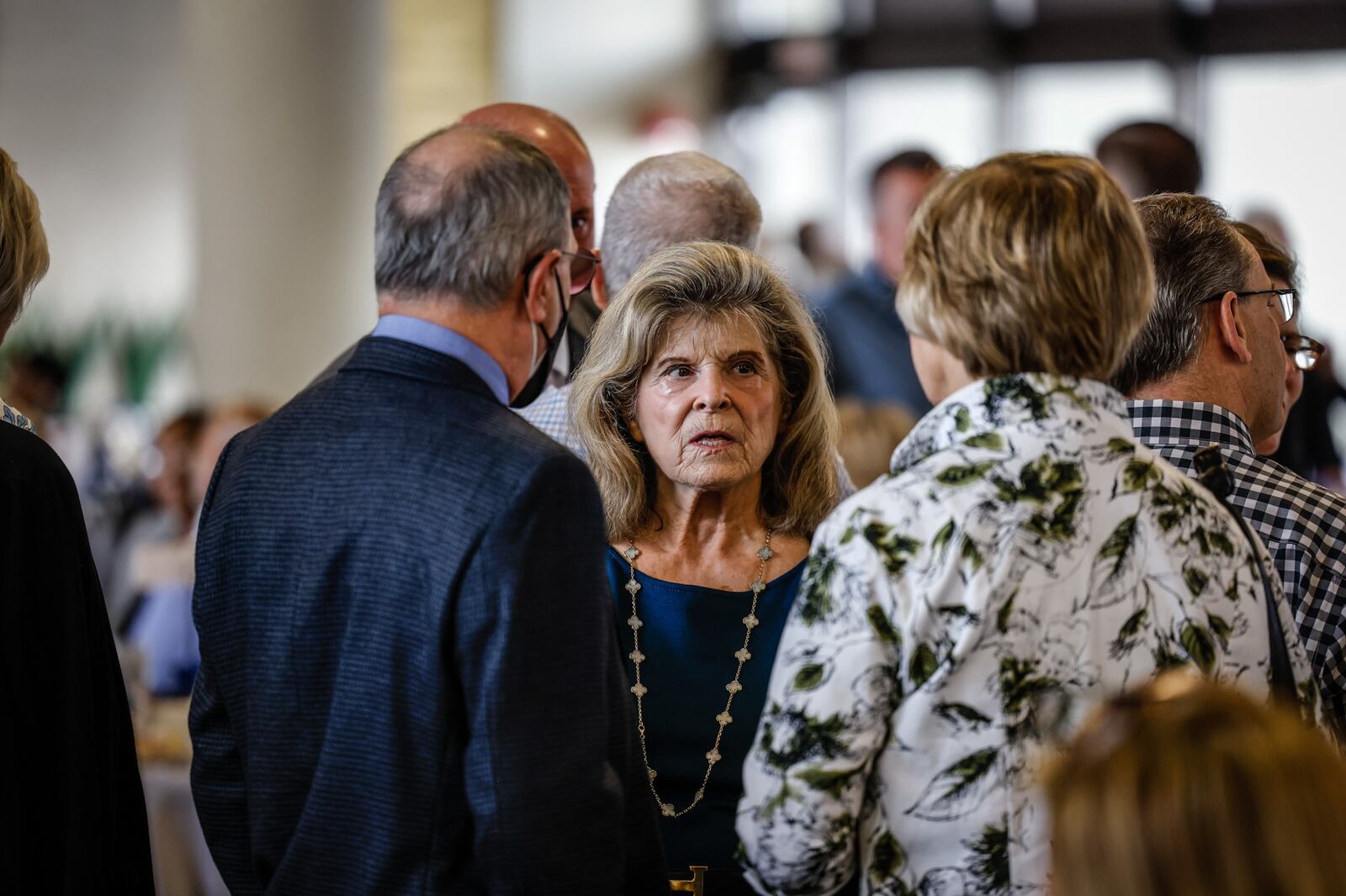 Carol Glass Pollock, sister of inductee Roger Glass, attends Wednesday's  2022 Dayton Region Walk of Fame inductee luncheon at Sinclair  Community College. About 400 people attended the yearly event. JIM NOELKER/STAFF