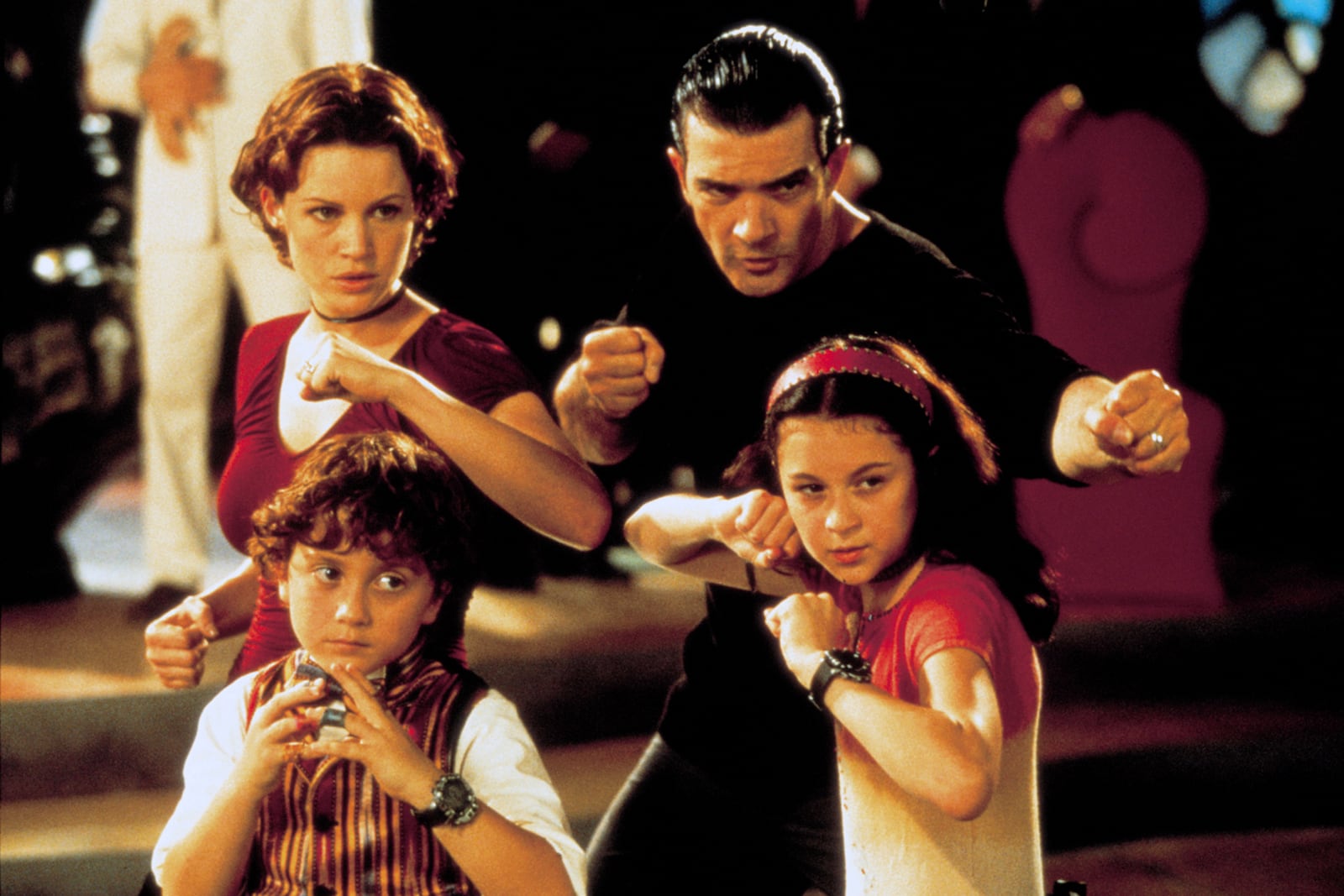 This image released by the Library of Congress shows clockwise from top left, Gina Gugino, Antonio Banderas, Alexa PenaVega and Daryl Sabara in a scene from the 2001 film "Spy Kids." (Spyglass Media Group/Library of Congress via AP)