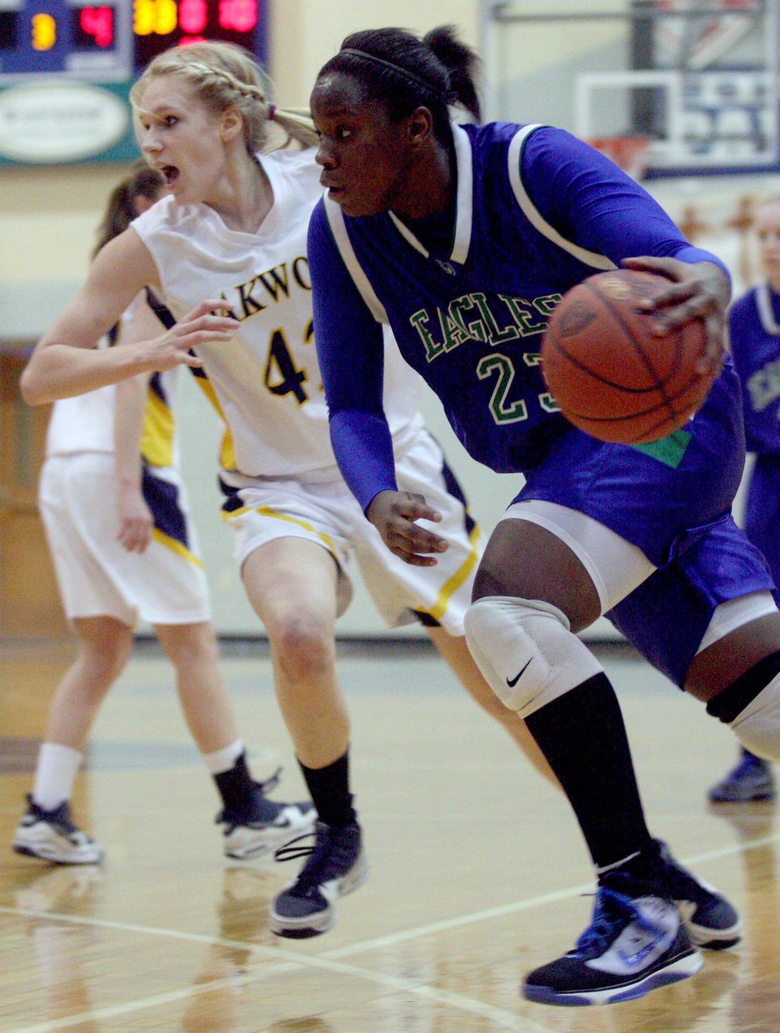 CJ's Samarie Walker tries to get past Oakwood defender Elizabeth Haley during Girls Division II Southwest District sectional tournament action at Springboro High School Saturday, Feb. 27, 2010. E.L. Hubbard/CONTRIBUTED