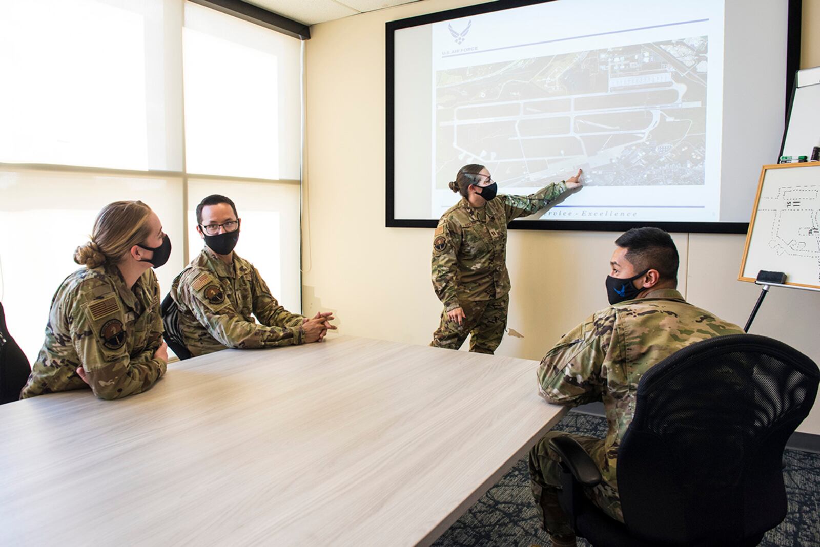 Capt. Elizabeth Andrade, commander of the 88th Operations Support Squadron’s Airfield Operations Flight, instructs students after the Follow-On Skills Training facility opening Nov. 3 at Wright-Patterson Air Force Base. U.S. AIR FORCE PHOTO/JAIMA FOGG