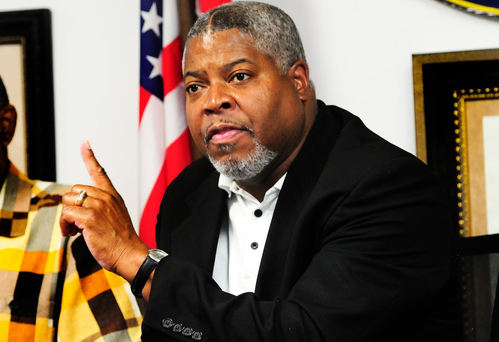 Dr. Derrick L. Foward, president of the Dayton NAACP, held a press conference Friday, July 5, 2024 at the NAACP headquarters on Salem Ave. to talk about the Dayton Police officer involved shooting and further action to remove guns from the streets. MARSHALL GORBY\STAFF