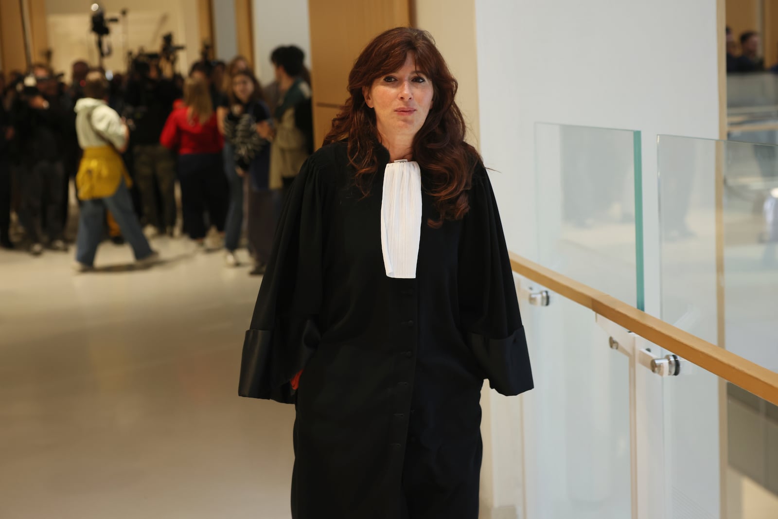 Plaintiffs' lawyer Carine Durrieu Diebolt leaves the courtroom, while Depardieu, who is facing trial for the alleged sexual assaults of two women on a film set in 2021, did not appear before a criminal court, Monday, Oct. 28, 2024 in Paris. (AP Photo/Thomas Padilla)