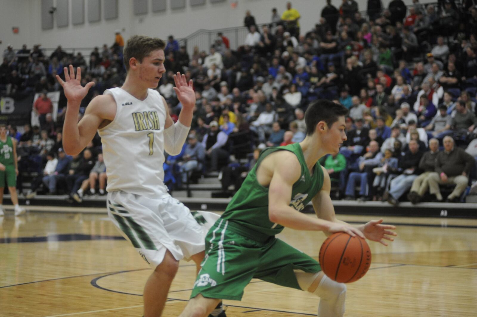 Scott Walter of Akron SVSM (left) and Fairland’s Ty Staten. Akron SVSM defeated Fairland 81-79 in the 16th annual Premier Health Flyin’ to the Hoop at Trent Arena in Kettering on Sun., Jan. 14, 2018. MARC PENDLETON / STAFF