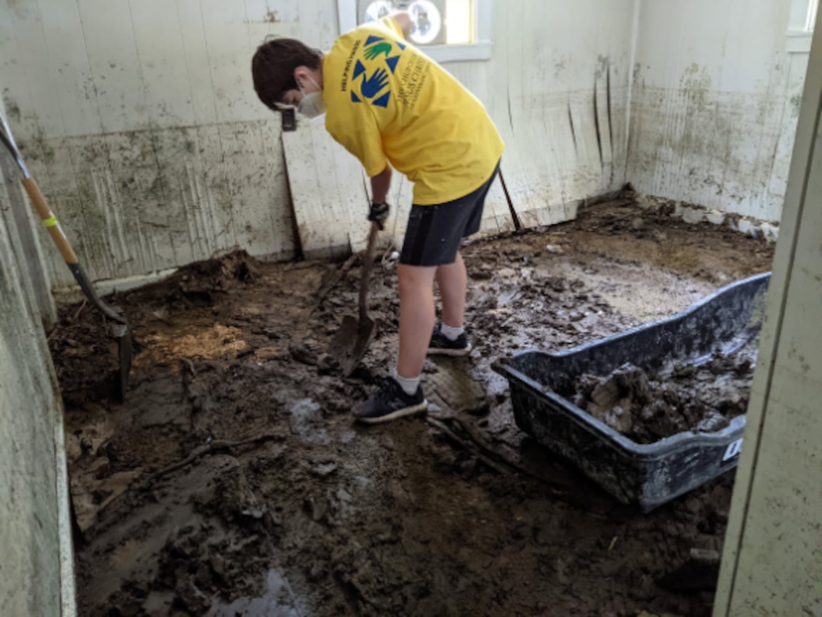 Volunteers from The Church of Jesus Christ of Latter-day Saints in the Dayton area traveled to eastern Kentucky to help flood victims clean their homes and remove trees, debris and furniture. Photo courtesy The Church of Jesus Christ of Latter-day Saints.