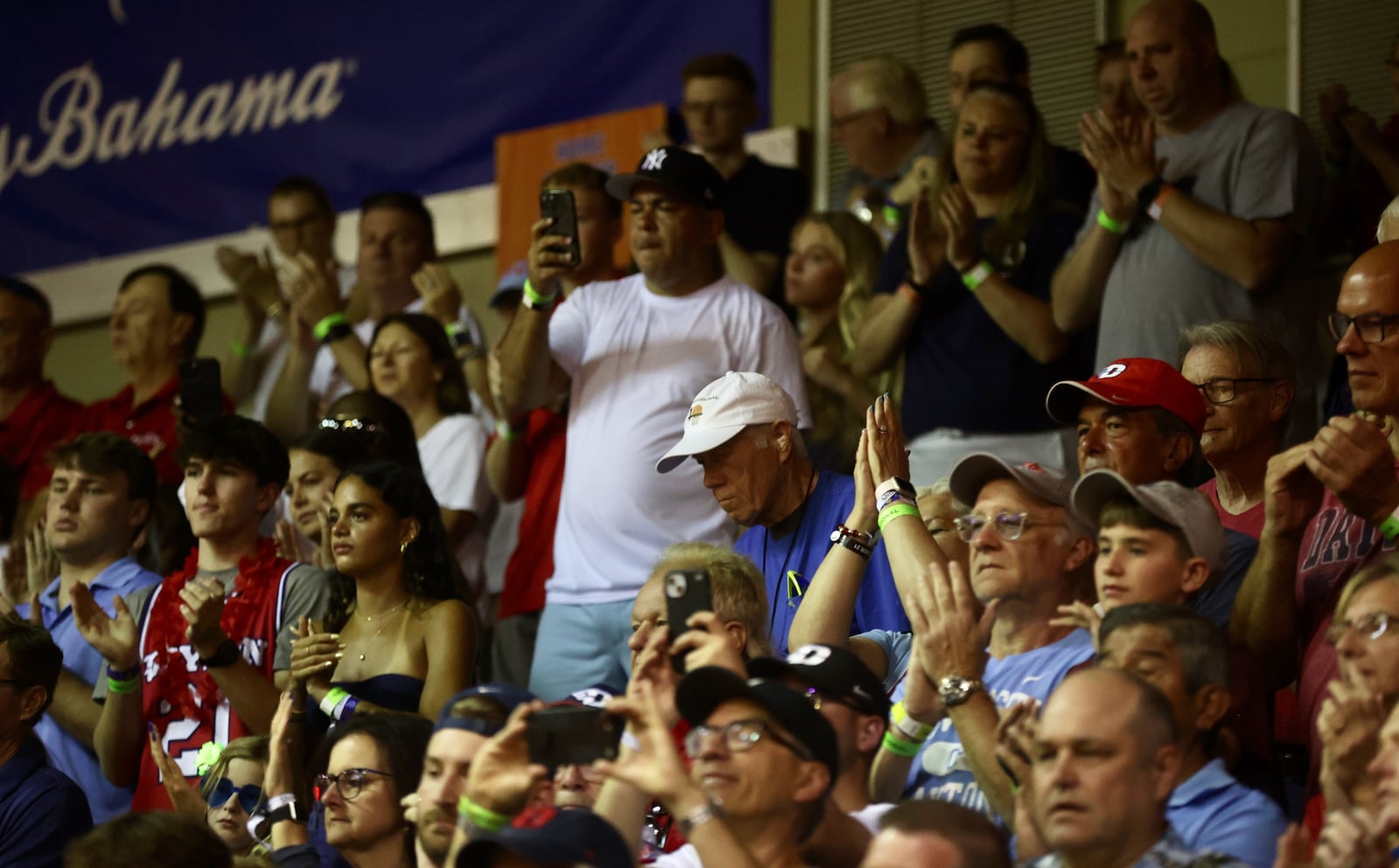 Elliot Rosado, father of Dayton's Malachi Smith, watches pregame introductions against Iowa State in the Maui Invitational on Monday, Nov. 25, 2024, at the Lahaina Civic Center. David Jablonski/Staff