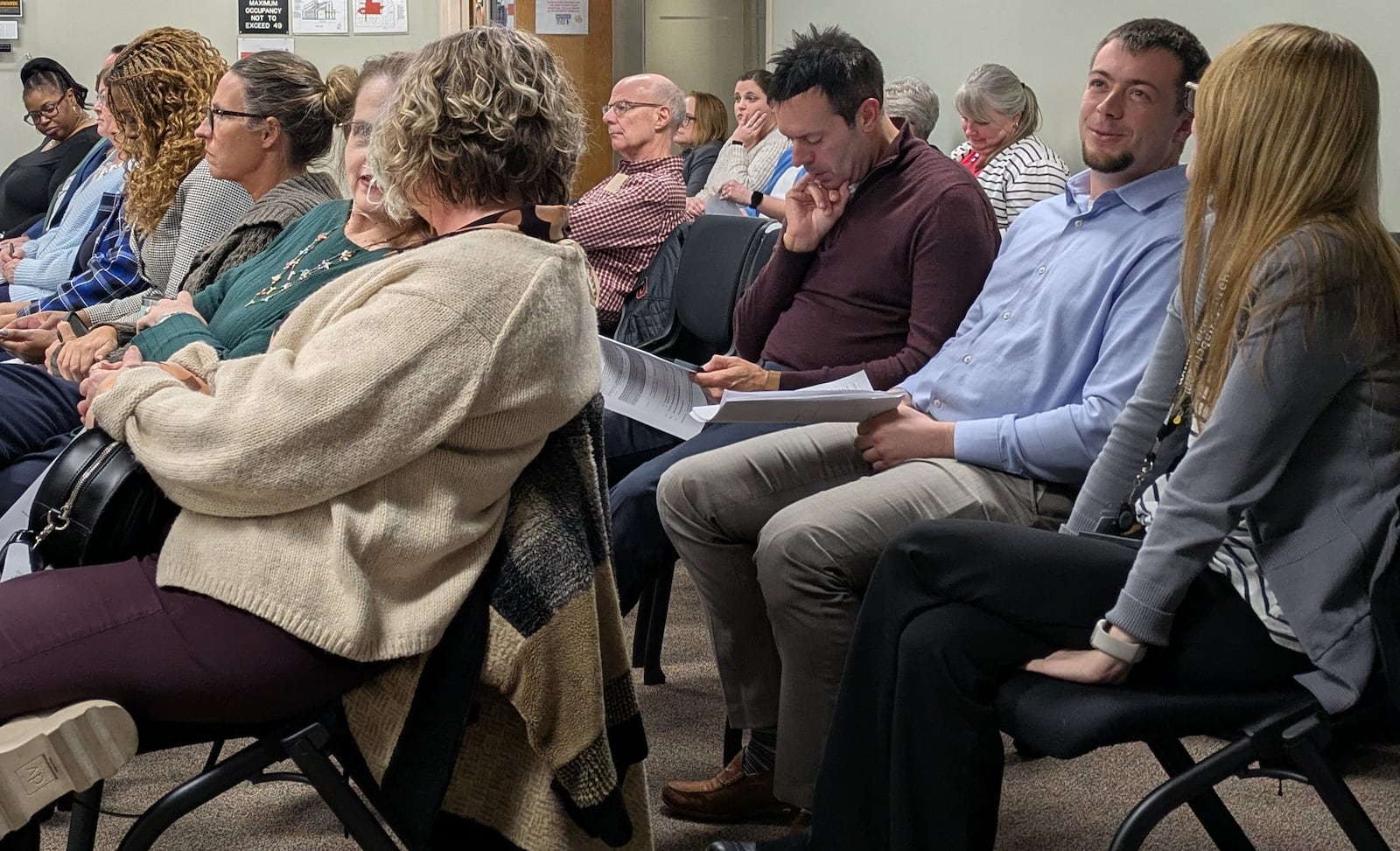 Audience members during the Montgomery County Alcohol, Drug Addiction and Mental Health Services board meeting where the board approved a contract with DeCoach Recovery Center to provide mental health crisis response services in Montgomery County on Feb. 26, 2025. SAM WILDOW/STAFF