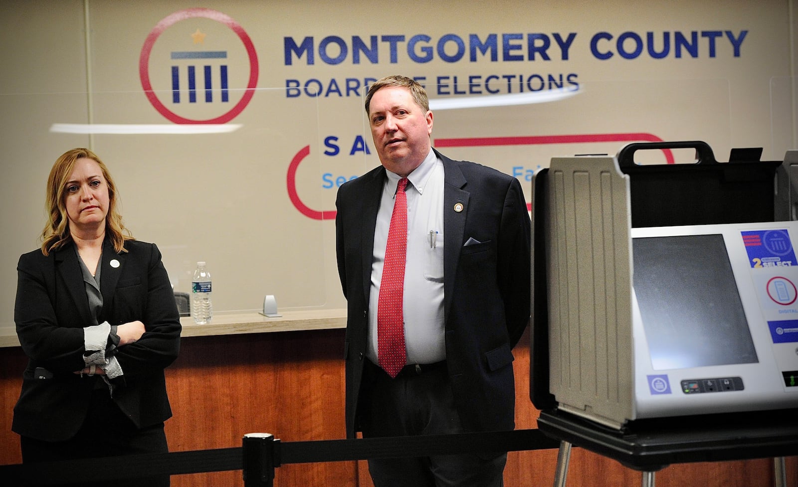 Sarah Greathouse, Montgomery County Board of Elections Deputy Director and Jeff Rezabek Montgomery County Board of Elections Director, answer questions from the media during an open house Wednesday, March 23, 2022. MARSHALL GORBY\STAFF