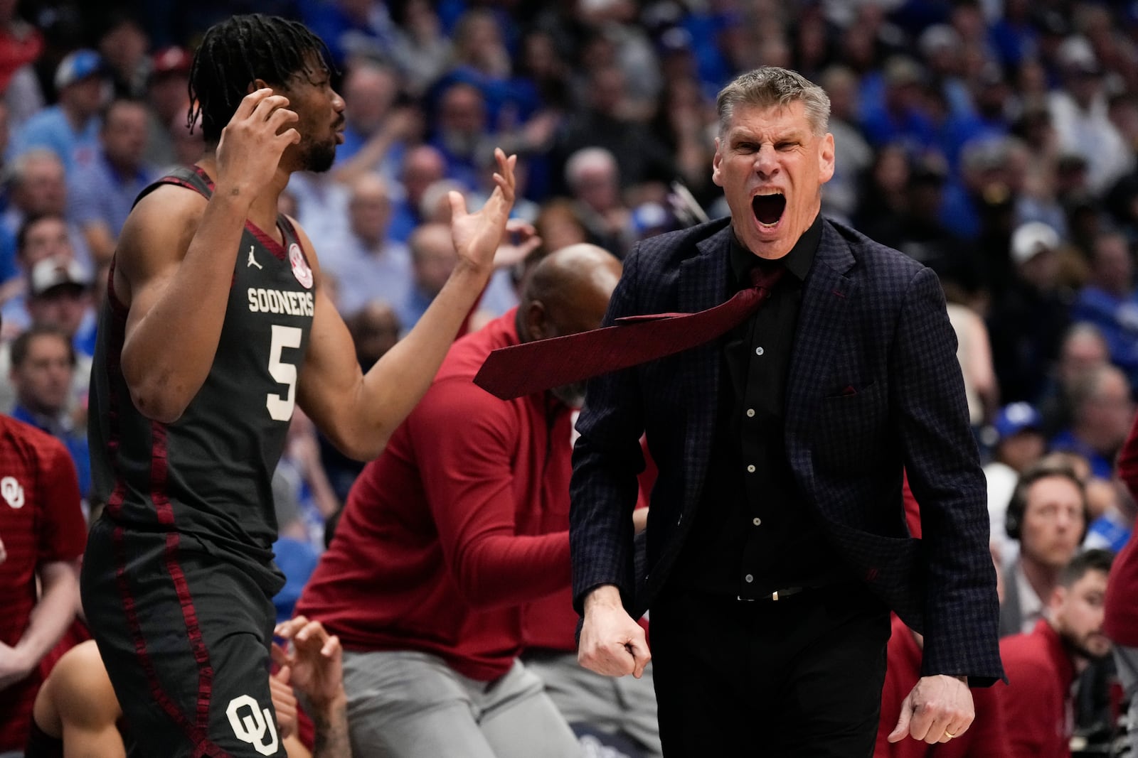 Oklahoma head coach Porter Moser reacts to play against Kentucky during the first half of an NCAA college basketball game in the second round of the Southeastern Conference tournament, Thursday, March 13, 2025, in Nashville, Tenn. (AP Photo/George Walker IV)