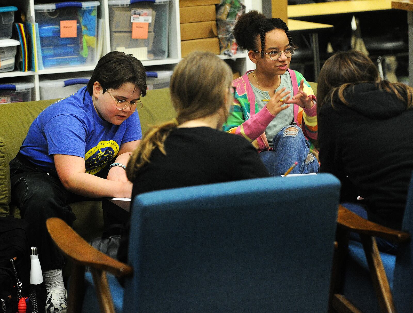 Dayton Regional STEM middle school students, from left, Kameron Jeter and Jo Nelson participate in a class discussion Wednesday, March 6, 2024. MARSHALL GORBY\STAFF