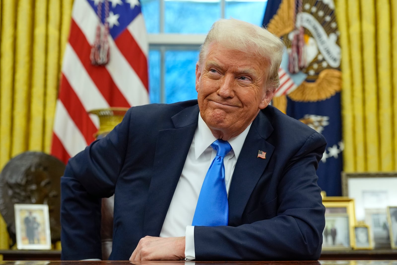 President Donald Trump speaks with reporters in the Oval Office at the White House, Tuesday, Feb. 11, 2025, in Washington. (Photo/Alex Brandon)