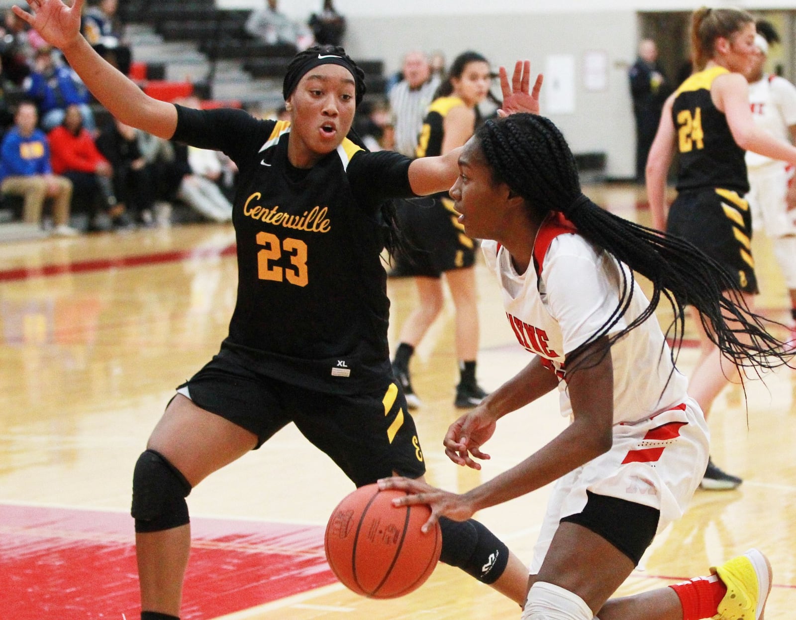 Bree Hall of Wayne (with ball) is checked by Cotie McMahon of Centerville. Wayne defeated visiting Centerville 56-37 in a GWOC girls high school basketball game on Wednesday, Dec. 11, 2019. MARC PENDLETON / STAFF