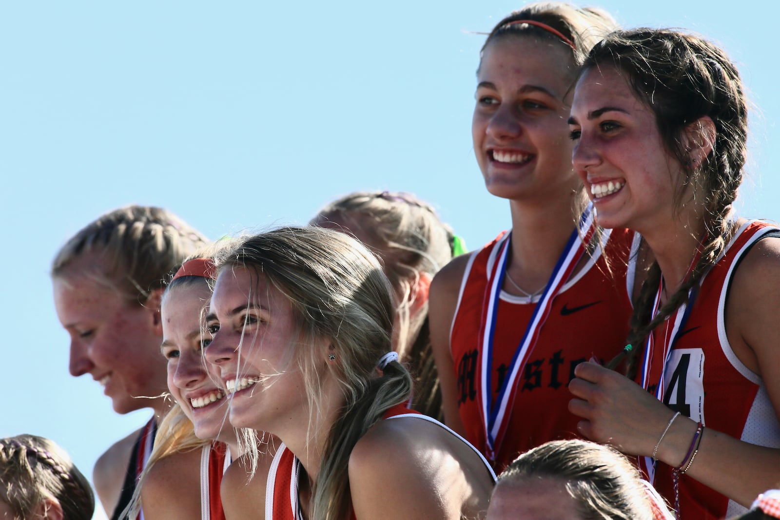 Minster 4x800 relay team stands atop the podium after winning a Division III state championship at the state track and field meet on Friday, June 3, 2022, at Jesse Owens Memorial Stadium in Columbus. David Jablonski/Staff