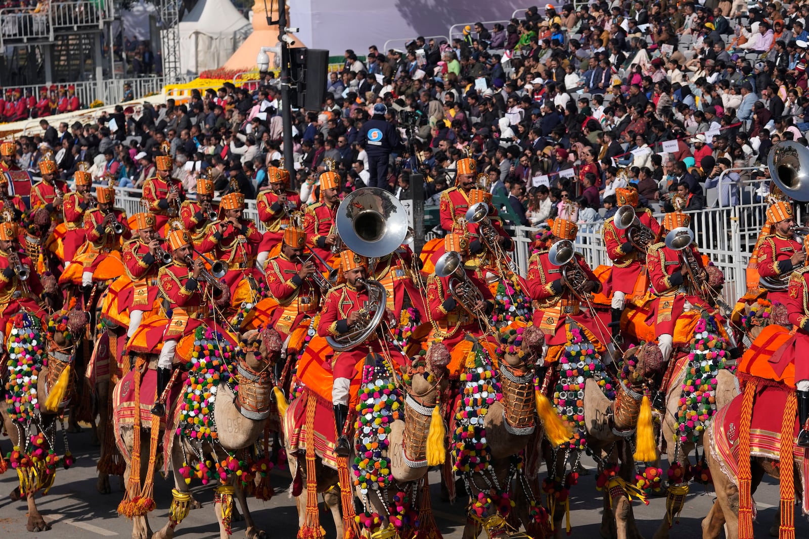 Indian defense forces march on camels through the ceremonial Kartavya Path boulevard during India's Republic Day parade celebrations in New Delhi, India, Sunday, Jan. 26, 2025. (AP Photo/Channi Anand)