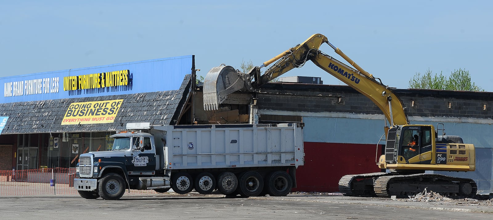 Demolition continues on the Marian shopping center Tuesday, April 27, 2021. The lot is the future home of the Huber Heights branch library. MARSHALL GORBY\STAFF