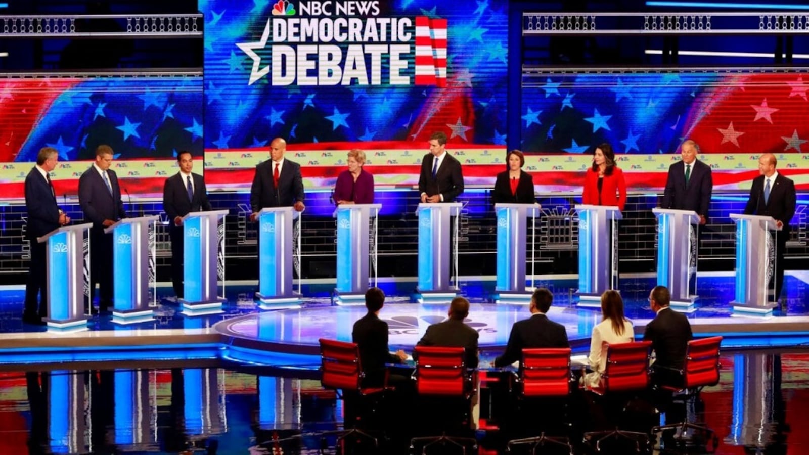 Former Housing and Urban Development Secretary Julian Castro, third from left, answers a question, during a Democratic primary debate Wednesday, June 26, 2019, in Miami.