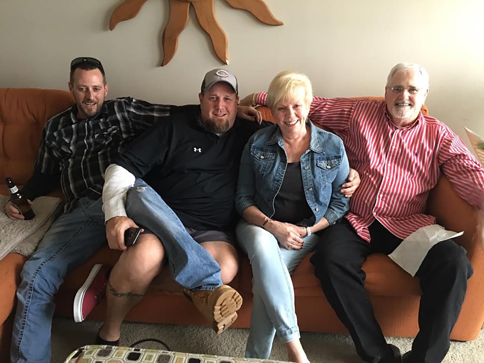 Jeanne Porter (second from right) with her sons, from left, Michael and  James and her husband Mike, right. CONTRIBUTED