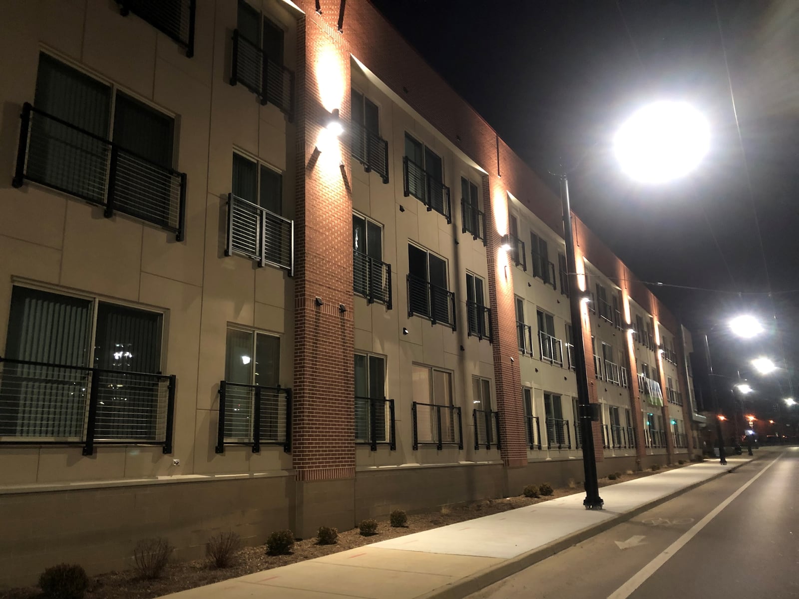 Street lights on Warren Street in front of the Flats at South Park apartment building, near the University of Dayton campus. CORNELIUs FROLIK / STAFF