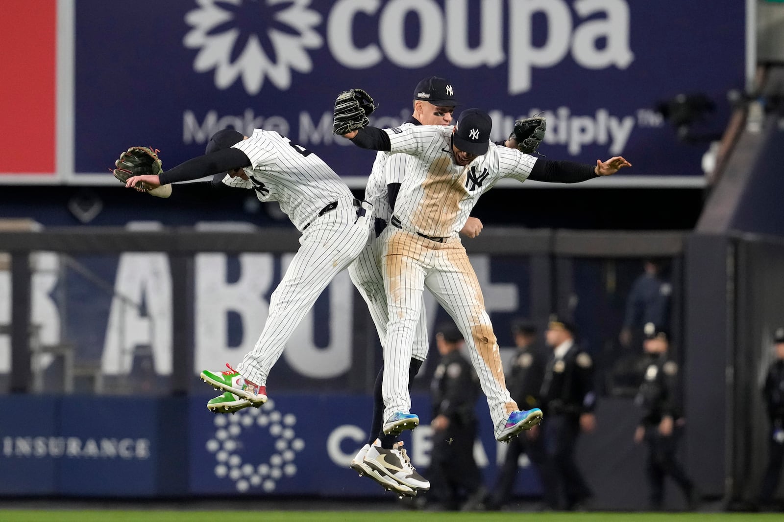 New York Yankees' Alex Verdugo, Aaron Judge and Juan Soto celebrate after Game 2 of the baseball AL Championship Series against the Cleveland Guardians Tuesday, Oct. 15, 2024, in New York. The Yankees won 6-3. (AP Photo/Godofredo Vásquez)