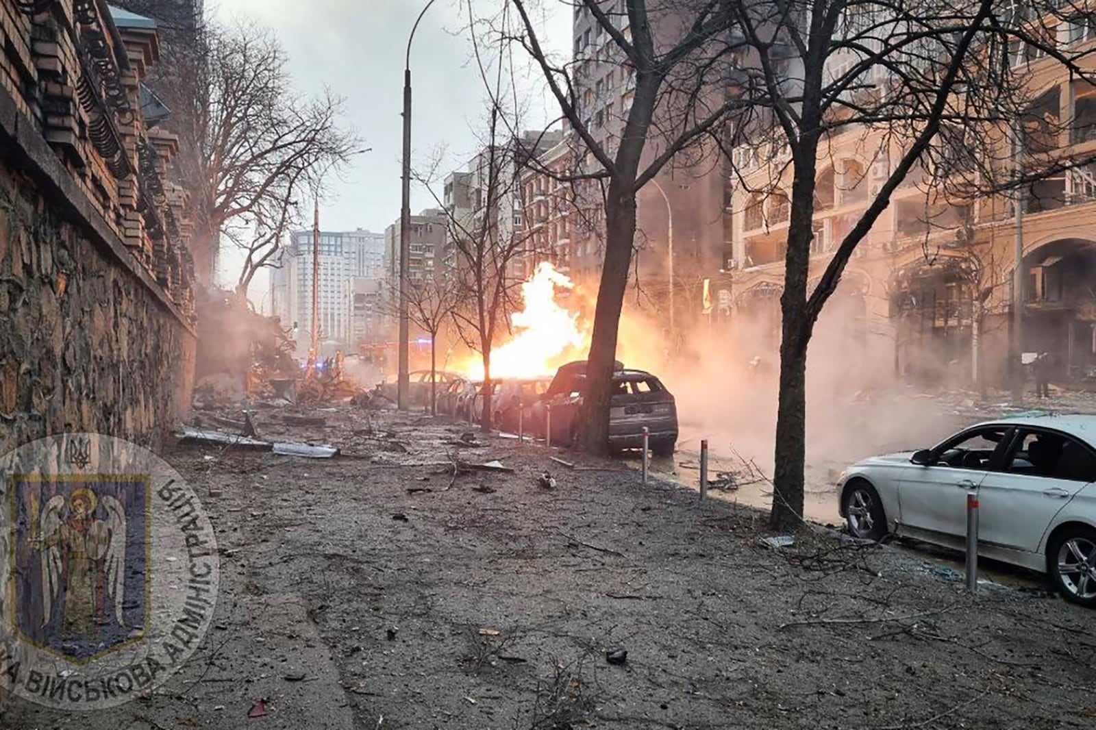 In this photo provided by Kyiv city's military administration, firefighters work on the site after a Russian missile attack in Kyiv, Ukraine, Friday, Dec. 20, 2024. (Kyiv city's military administration via AP)