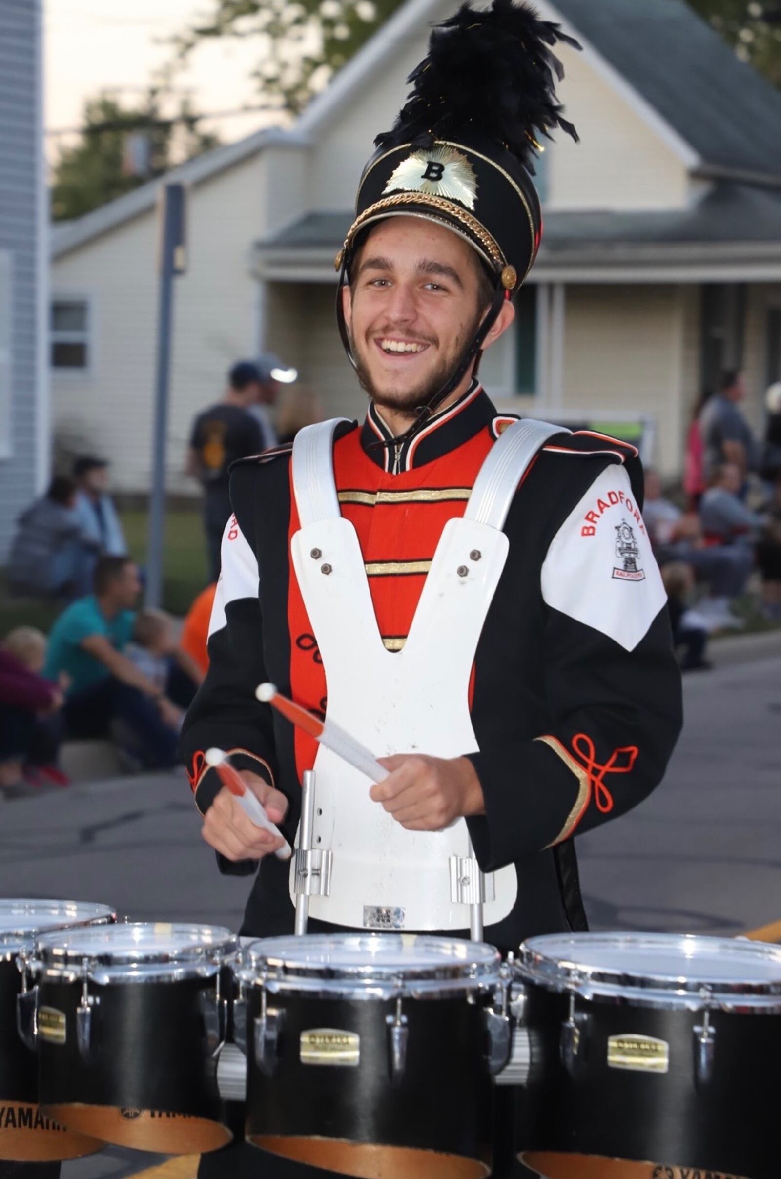 Connor Jones playing marching tenor quad drums in Bradford band. CONTRIBUTED