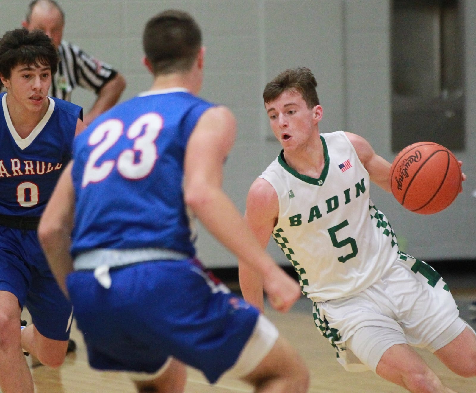 Donovan Watkins of Badin draws Carroll defender Steven Chapman. Badin defeated visiting Carroll 65-52 in a GCL Co-Ed boys high school basketball game on Friday, Dec. 20, 2019. MARC PENDLETON / STAFF