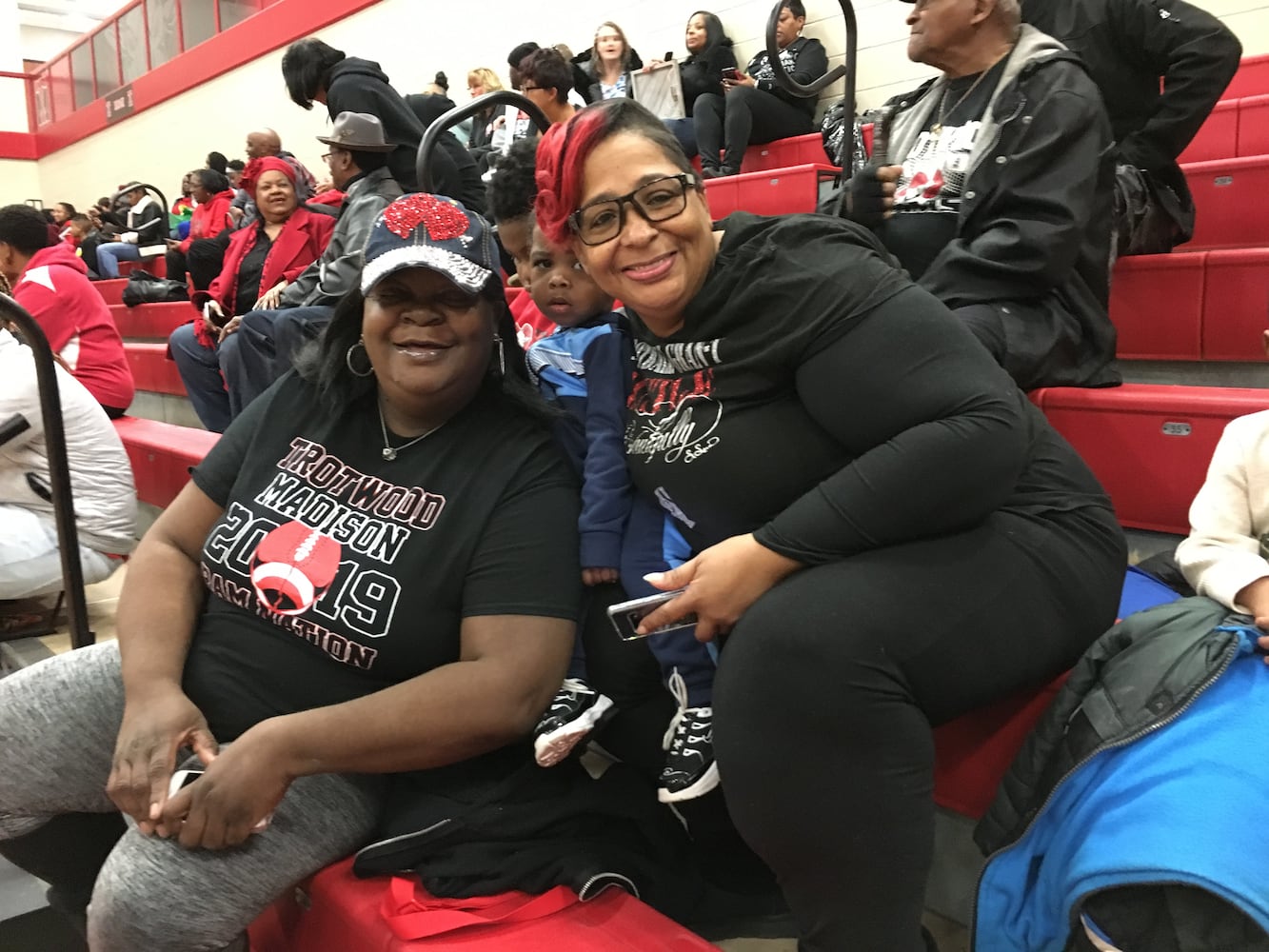 PHOTOS: Trotwood parents and fans welcome home football state champs at victory celebration