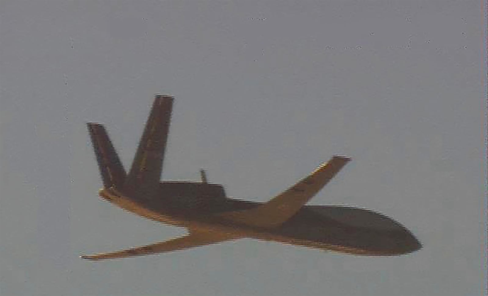 This photograph released by Taiwan Ministry of National Defense taken from a Taiwan Air Force P-3C Orion anti-submarine aircraft, shows a Chinese Cloud Shadow WZ-10 drone near Taiwan, Monday, March 17, 2025. (Taiwan Ministry of National Defense via AP)