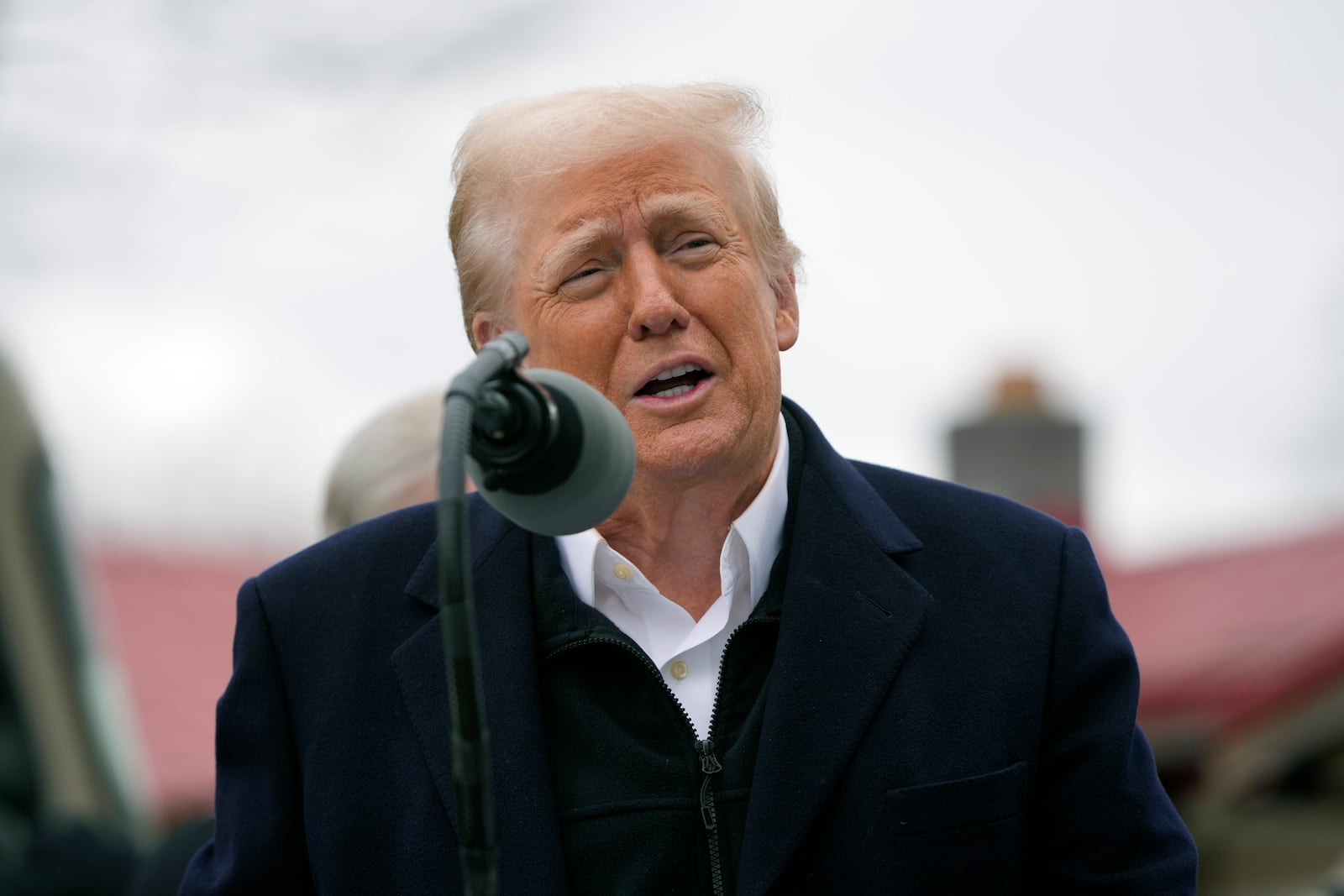 President Donald Trump speaks as he meets with homeowners affected by Hurricane Helene in Swannanoa, N.C., Friday, Jan. 24, 2025. (AP Photo/Mark Schiefelbein)