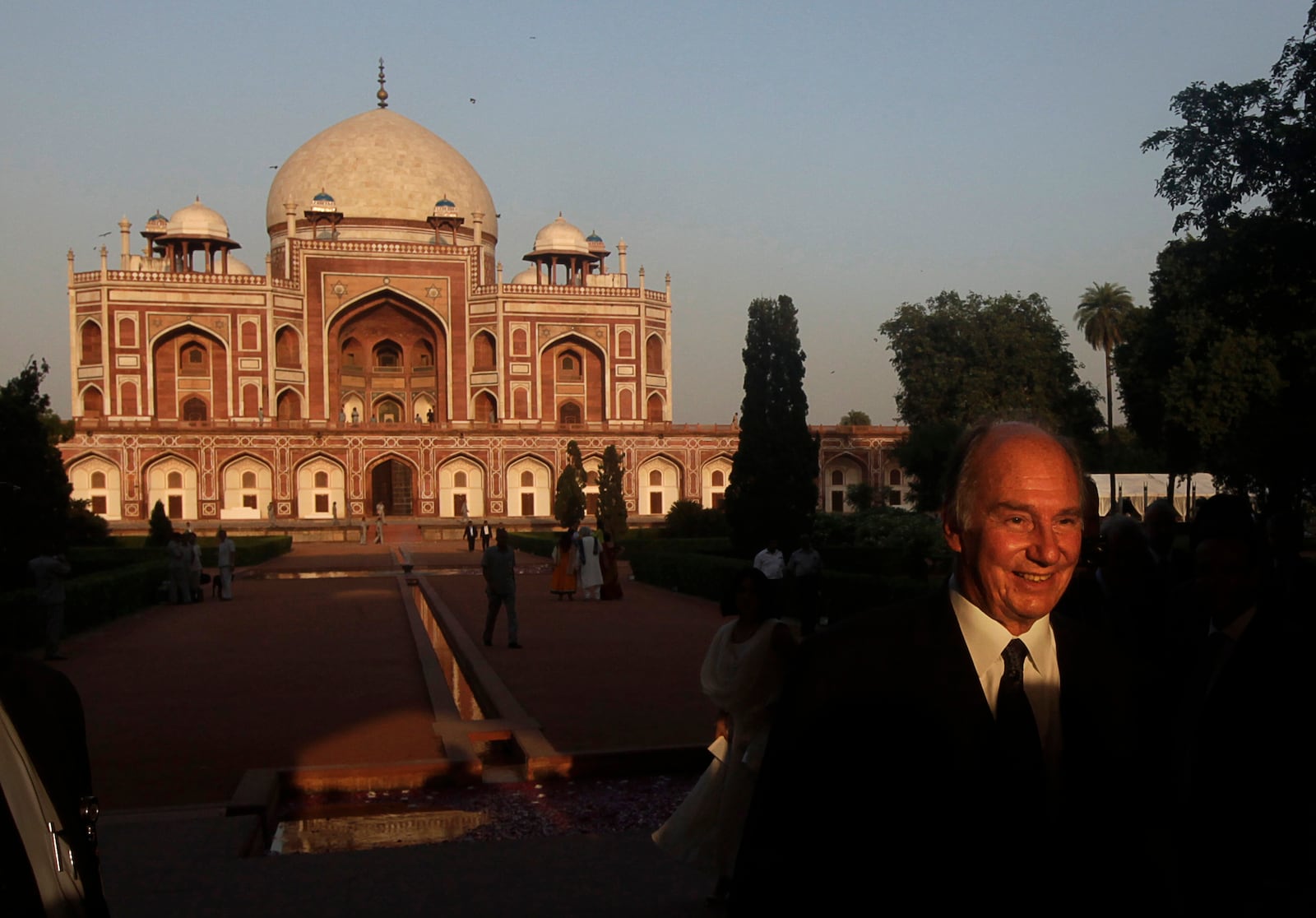 FILE - The Aga Khan, spiritual head of Ismaili Muslims, leaves after the inauguration of the restored 16th century Humayun's Tomb in New Delhi, India, Wednesday, Sept. 18, 2013. (AP Photo/Manish Swarup, File)