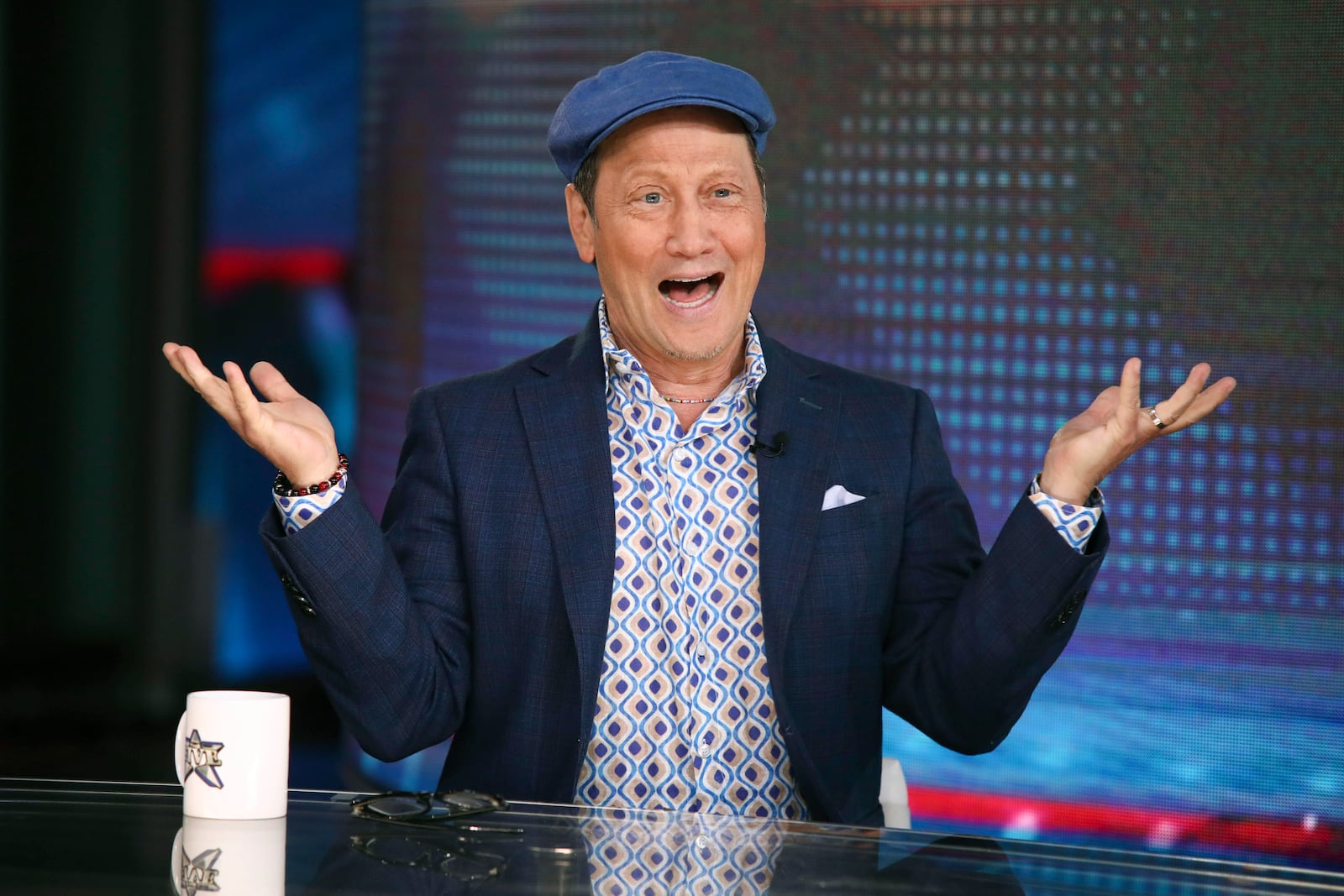 Comedian Rob Schneider appears on "Jesse Watters Primetime" to promote the show "FOX Nation's Rob Schneider: Woke Up in America" on Tuesday, June 20, 2023, in New York. (Photo by Andy Kropa/Invision/AP)